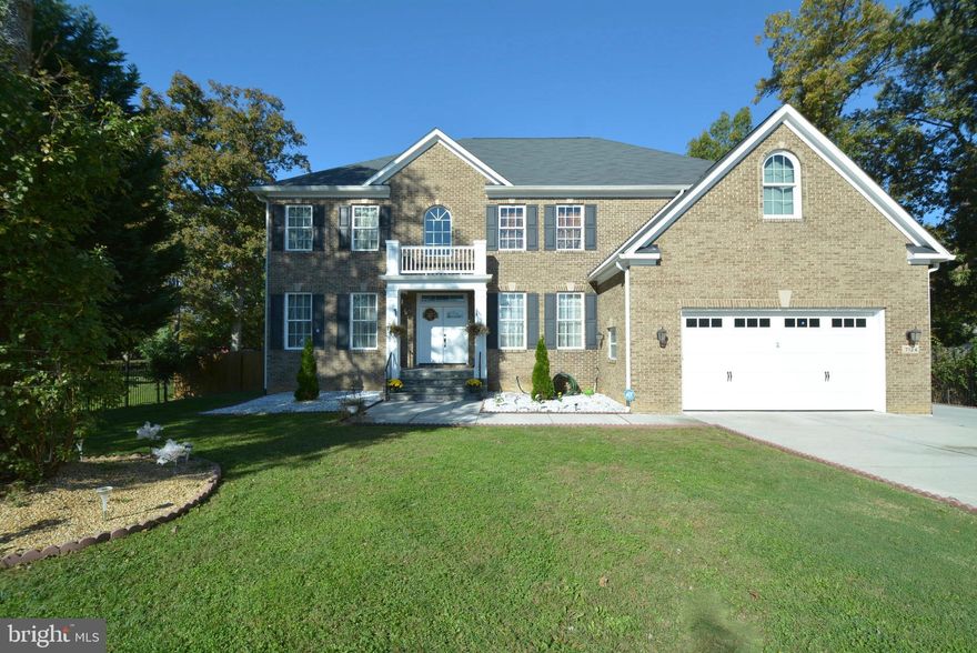 Amazing Value  Home of builder with all the upgrades, high end materials. Open concept, large bedrooms, custom bathrooms. Bianco Carrera Marble in Master Bath and Chef's kitchen. High End appliances, GE Cafe natural gas stove. Great basement area with movie theater, spacious bar with granite counters