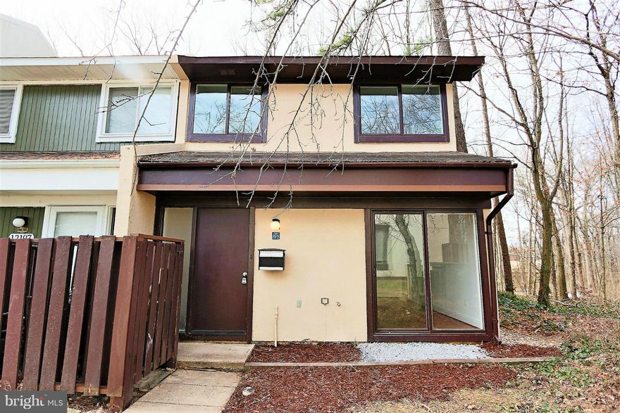 End-unit 3 bd,1.5 ba Reston TH that backs to trees. This 2 lvl, 1,197 sqft TH has an open layout on main lvl that is naturally lit by 2 sliding doors. Freshly painted & hw floors on both lvls. Large fenced-in patio w/ attached shed opens to wooded trail. Big walk-in master & hall closets. 2 assigned parking spaces! Enjoy Reston Assn amenities w/ low HOA dues. Mins to RTC, 267 & Silver line metro.