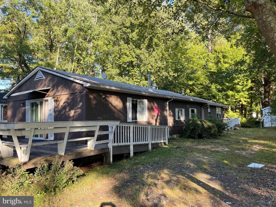 Discover the potential of this fixer-upper nestled in a water access community with seasonal Potomac River views and mesmerizing sunsets.   This compact rambler-style home, in an ideal location, offers a lot of possibilities. 
You can transform this property into your dream retreat, all while enjoying the views and non deeded access to the ever-changing beauty of the river. This great investment property is being sold strictly as is - Cash or 203K financing. 
 Don't miss the opportunity!