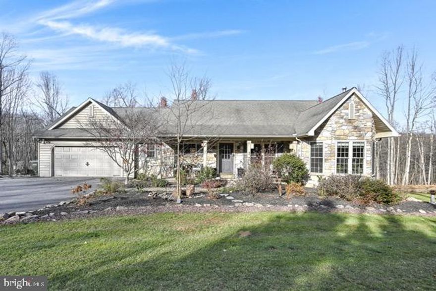 Welcome to this exceptional 4,382 sq ft residence, nestled on a quiet private road in the highly desirable Cocalico School District. Meticulously maintained and thoughtfully updated by its current owners, this home sits on a picturesque 5-acre lot backing to state game lands, offering a rare blend of luxury, comfort, and unmatched privacy.
Step inside to a spacious, well-designed floor plan highlighted by a first-floor remodel completed in 2025. The chef’s kitchen is a standout, featuring premium Viking appliances, custom cabinetry, generous counter space, and an ideal layout for entertaining and gourmet cooking. The main level also includes a newly remodeled primary suite, along with two additional well-sized bedrooms—one currently used as a home office.

Unwind in the all-seasons room, complete with a wet bar, custom ice maker, and serene views of the surrounding landscape. The beautifully finished walkout basement adds remarkable versatility, offering four additional bedrooms, a workout room, and a full kitchen—perfect for extended living or guests.

Efficient liquid propane heating and a wood-burning stove provide year-round comfort. Outside, enjoy your private retreat with a full deck ideal for grilling, an additional fire pit seating area for outdoor gatherings, and two storage sheds for added convenience.

Key Features:

4,382 sq ft of impeccably maintained living space
Chef’s kitchen with premium Viking appliances
Newly remodeled first floor and primary suite (2025)
Finished walkout basement with full kitchen
Spacious walk-in closet in the primary suite
5-acre lot backing to state game lands
Efficient liquid propane heating and wood-burning stove
Two storage sheds
Additional 3-acre lot available as a separate parcel
Don’t miss this rare opportunity—schedule your private showing today and experience this inviting property firsthand.
