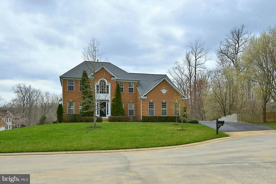 Beautifully done ! Impressive! This stately 3 level colonial has 4 bedrooms,  3.5  baths* 2-car garage*Granite & stainless in kitchen* Enjoy morning coffee in the  breakfast area w/ 2 skylights* Hardwood on Main level* Family room w/gas Fireplace & 2 skylights* New carpet upper level* New roof  & new skylights 2012* HVAC & Furnace 2013, Dual zone* Walk out basement*Deck* Cul-de-sac* Welcome Home!