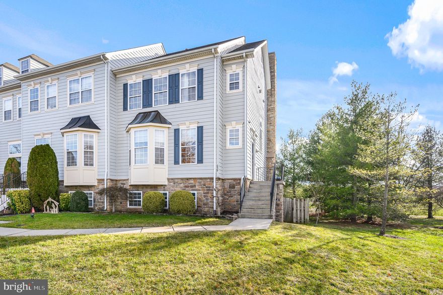 Welcome home to this beautiful end unit townhome in the heart of the Potomac Crossing community! This 4 bed, 3.5 bath home is close to 3,000 square feet over 3 levels.  The main level features a living room with gorgeous bay windows & large dining room for entertaining. The kitchen is a chef's dream with a large center island, beautiful cabinetry, double wall oven, mosaic backsplash, breakfast nook, and sliding barn doors added to pantry (2021). Family room flows beautifully from kitchen and has a cozy gas fireplace. Main level also features a half bath. 

Bedroom level has gorgeous bamboo flooring covering the entirety of the upper level (2020). Primary suite has vaulted ceilings, spacious walk-in closet, & luxurious en-suite bath. Spa-like primary bath has relaxing soaking tub, his & hers vanities, updated fixtures (2021), & glass walk-in shower. Two additional bedrooms found on this floor & share a full hall bath. Beautiful custom laundry room with newer washer & dryer also located on upper level (2021). Lower level has a large recreation room, fourth bedroom, full bath & great storage space. Walk out to private fenced-in backyard with large deck overlooking common area and overlooking Balls Bluff Elementary School fields. There is also a shed for storage, plenty of space for recreation & community green space located just beyond the fence. Located just minutes from Potomac Crossing Park & Leesburg Premium Outlets. 

Additional recessed lighting added on main level in 2023. Ceiling fan/light fixture in family room updated in 2023. Dining Room light fixture updated in 2023. All shower heads, faucets (except lower level), & toilets updated in 2023. 

The room in the basement is not listed as a bedroom in the tax records but has a closet and 3 windows. 

WELCOME HOME!