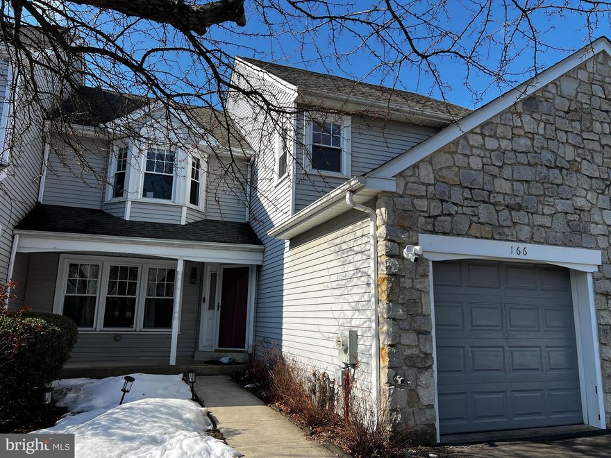 Welcome to this bright and sunny Montgomery Greene townhome, where natural light pours through newer windows to highlight a meticulously maintained interior. This 3-bedroom, 2.5 bathroom townhome offers incredible peace of mind with major recent updates, including a new roof (2021), a new heater (2022), and a new water heater (2022). For added quality of life, the home is also equipped with a whole-house water filtration system. Sophisticated hardwood floors, installed in 2016, flow seamlessly throughout the entire home, creating an upscale and cohesive atmosphere.
The main level is designed for effortless living, featuring spacious living and dining rooms that transition into an airy eat-in kitchen equipped with a breakfast bar and stainless steel appliances. The kitchen opens directly to a cheerful, sun-drenched family room anchored by a cozy fireplace, with a sliding glass door leading to the rear deck for easy outdoor enjoyment.
The second floor is highlighted by a generous primary suite featuring two walk-in closets and a large private bathroom. Two additional nice-sized bedrooms share a well-appointed hall bath, while the upstairs laundry room adds a layer of modern convenience.
Ideally situated for any lifestyle, this home offers unparalleled access to Route 309, 202, 463, and the PA Turnpike. Commuters will appreciate the proximity to several SEPTA R5 stations, while premier shopping and dining options like Montgomery Mall, Wegmans, and Whole Foods are just minutes away. This is turnkey, light-filled living at its finest in a highly sought-after community.