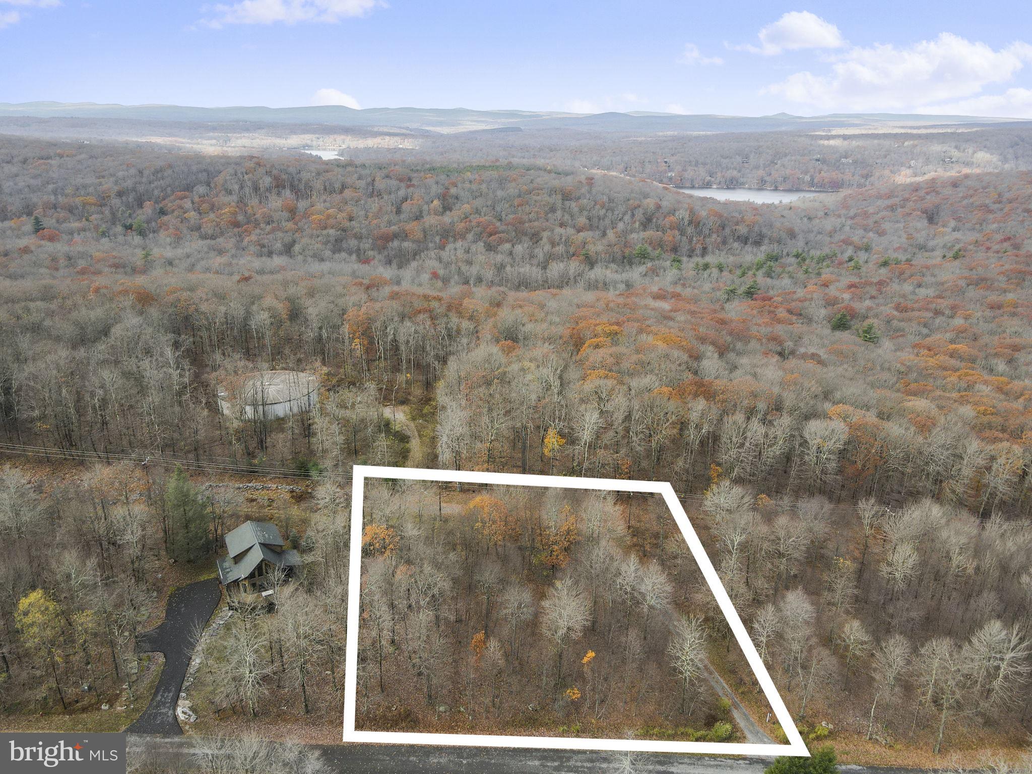 Can't find the home you're looking for? Buy land and build it your way at Deep Creek Lake! This 1 acre parcel is in the lake access community Mountainside and is centrally located to Wisp Resort, State Parks and local Restaurants. Community offers Marina Club, tennis, hiking and biking. Great vacation rental potential. Public water and sewer hook-ups are available. Enjoy what Deep Creek Lake has to offer year round. The only thing this property is missing is your dream home!