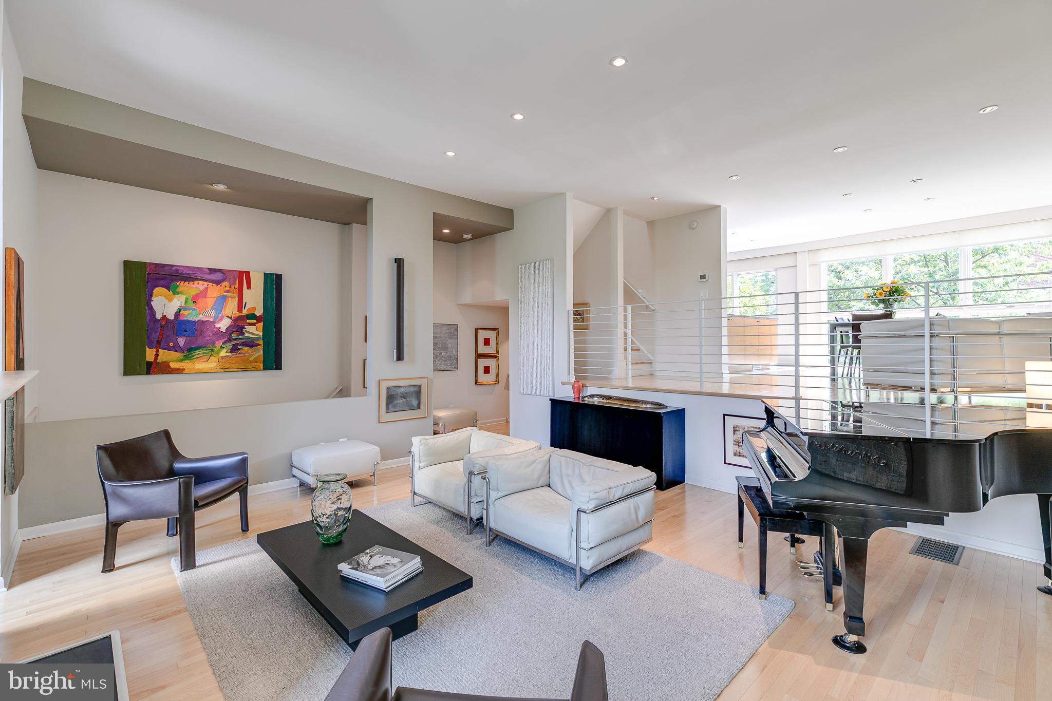 A master architect of mid-century modern design, Louis Sauer, designed this Society Hill residence with his signature understanding of modern living, featuring tall ceilings, an abundance of natural light, including both a front terrace and private rear garden areas. The home has been thoughtfully renovated throughout, it runs 24' wide and includes 2-car gated parking. 228 Locust generously meets the needs of any luxury urban buyer. The home has 3 bedrooms, 3 full baths plus a large, versatile bonus room along with plenty of storage. The home is located on a quiet tree-lined street, you'll enjoy unobstructed views of private, manicured grounds. In addition, you'll find yourself just steps away from Philadelphia's most historic sites, a broad range of restaurants & commerce, the arts, mass transportation options, and the city's main highway systems. And finally, Society Hill is home to the finest public and private schools.