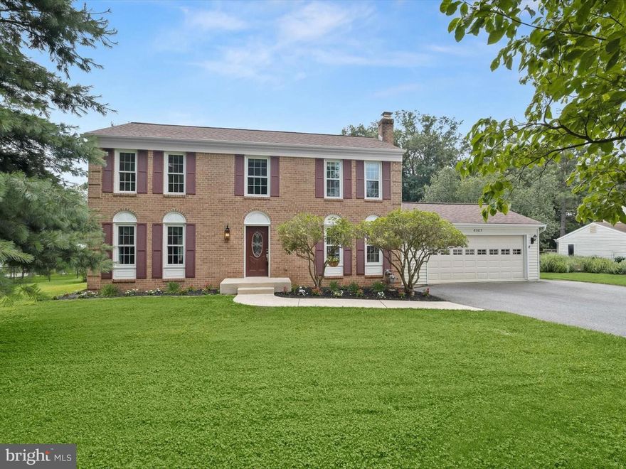 Welcome to 6305 Oklahoma Road, a meticulously maintained Colonial that beautifully blends timeless charm with modern updates. This spacious home showcases refinished hardwood floors, classic moldings, and light-filled interiors throughout. The inviting foyer opens to formal living and dining rooms, both enhanced with elegant trim details. The dining room features a bay window that offers lovely views of the backyard, creating a perfect setting for both casual and formal gatherings. The eat-in kitchen is thoughtfully designed with sleek stainless steel appliances, granite countertops, soft-close cabinetry, decorative backsplash, undermount lighting, a breakfast bar, and a sunlit breakfast room with direct access to the expansive rear deck ideal for outdoor entertaining. The adjoining family room is anchored by a decorative fireplace and finished with custom moldings and wainscoting, offering a cozy yet sophisticated space to relax. Upstairs, the primary suite features a walk-in closet and a private en-suite bath. Three additional bedrooms and a full hall bath provide comfortable accommodations for family or guests. The finished lower level includes a spacious recreation room with brand-new plush carpeting, a dedicated laundry area, and ample storage space.  Sitting back from the road and sited on a beautifully pro-landscaped half acre, the home also features a 2-car attached garage, secure outdoor storage, a patio, an expansive partially covered deck perfect for enjoying the peaceful surroundings.  Located just steps from Oklahoma Middle School, this home has been thoughtfully updated with a newer roof, HVAC system, fresh paint, and more, offering peace of mind and move-in ready appeal.  Some photos have been virtually staged.