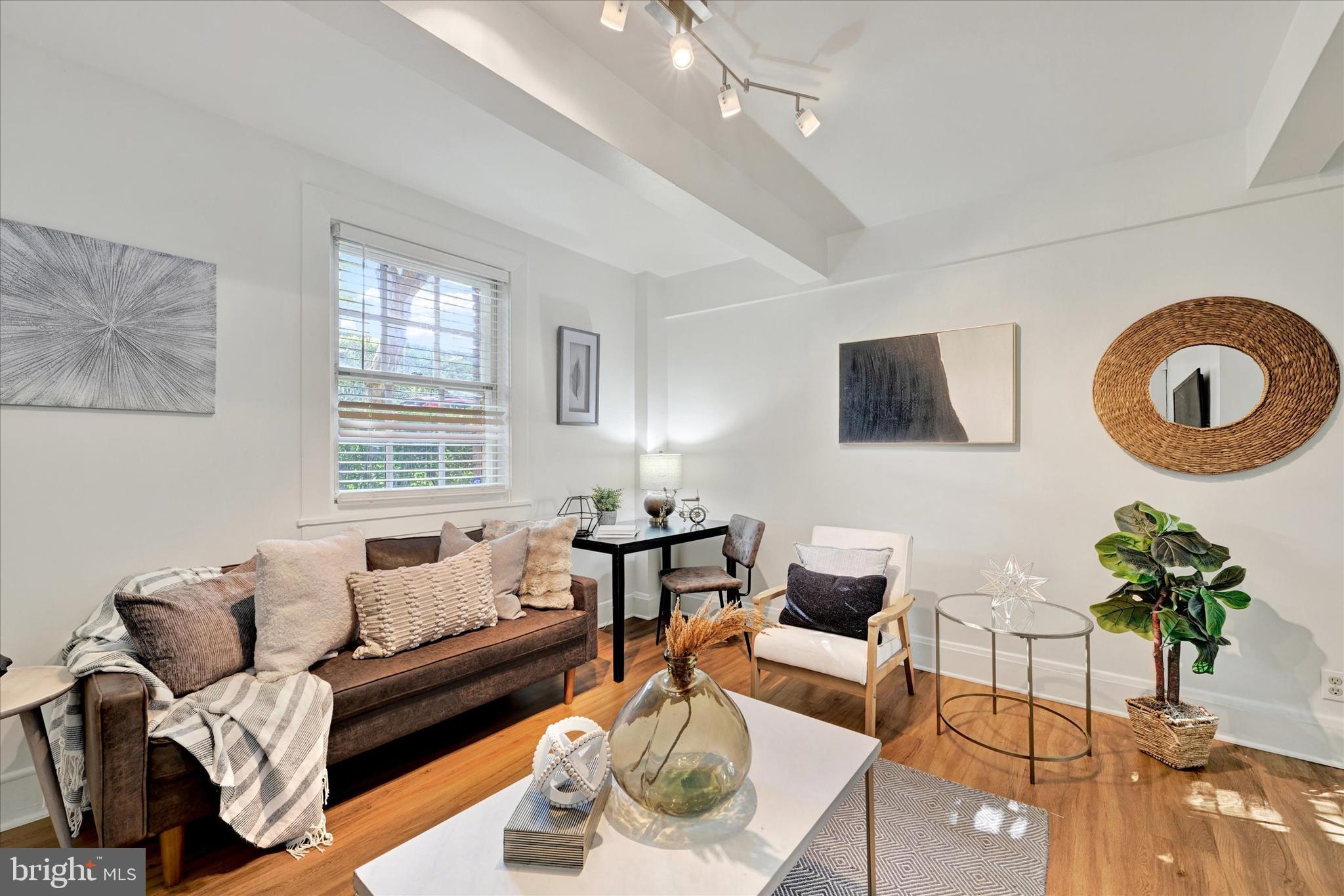 This home is convenient to all things, Roland Park, Gilford, Hampden, Homeland and the Johns Hopkins Homewood Campus. Situated in the picturesque Tuscany-Canterbury neighborhood, one of Baltimore's most charming areas, is the historic Lombardy building! Welcome to this unique, ground-level 2-bedroom unit that offers a private entrance and a tranquil covered patio. A beautiful space to call home is set amidst beautifully landscaped grounds, mature trees, and a serene atmosphere that feels like a country cottage. Inside, you'll find the beautiful simplicity of bright white walls, a spacious eat-in kitchen with granite countertops, tiled backsplash and gas stove. The main bedroom offers a private bath with a jetted tub. The second bedroom is versatile; ideal as a guest room or home office. Additional features include an upgraded mini-split ductless A/C system for summertime comfort. The co-op fee covers property taxes, heat, water, sewer, storage, exterior maintenance, grounds upkeep, and insurance. Street parking is available and garage space can be rented. Laundry is conveniently located on-site, and pets are welcome! Make your appointment now! (The unit is On Stoneyford. Look for the 220 Stony Run Sign. Go down the steps to the garden level unit on the side of the building - just before the garages.) *** The owner must occupy the unit for 3 (three) years before it is able to be sublet. Board approval is required to be a rental and of the perspective tenant) ***