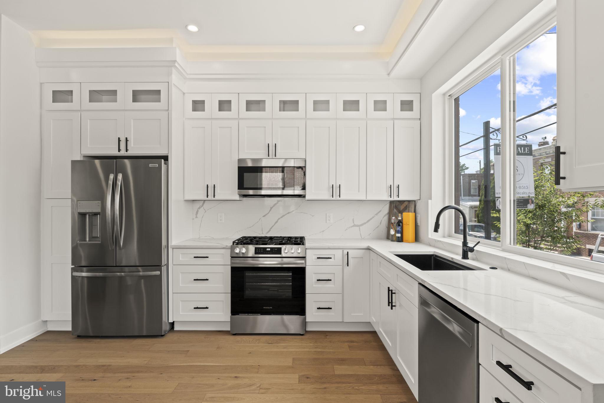 Welcome to 3009 Gaul Street — a stunning, new construction home in the heart of Port Richmond, blending modern design with high-end finishes and thoughtful functionality across all three levels.
This 3-bedroom, 2.5-bath home features an open-concept main floor with sun-drenched living and dining areas, a stylish chef’s kitchen with waterfall-edge countertops, premium appliances, abundant cabinetry, and a convenient first-floor powder room. A private backyard offers just the right amount of outdoor space for pets, grilling, or a quiet retreat.
The entire third floor is a dedicated primary suite, complete with a luxurious en-suite bathroom featuring a rainfall shower, body sprayers, built-in bench, and double vanity. Step out onto your private balcony—perfect for morning coffee or evening relaxation.
Laundry is conveniently located on the second floor along with two additional bedrooms that share a beautifully designed guest bathroom with a deep soaking tub. Both full bathrooms feature heated floors for added comfort, while the half bath offers convenient functionality.
A full, unfinished basement with high ceilings offers incredible potential for a home gym, media room, or additional living space or just additional storage.
3009 Gaul Street offers sophisticated city living with luxury finishes, smart design, and space to grow—all in one of Philadelphia’s most exciting neighborhoods. Schedule your private tour today!