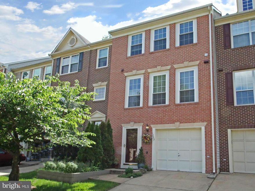 Fabulous! Main living level is to die for--open concept w/ renovated KIT. (lighting, cabinets, granite, SS apps), sliding doors that open to deck & woods. One of the few models w/ stairs leading from the deck to patio. Private yet bright! NEW--furnace, HWH, W/D, gas insert for fp. Painted thru out, lovely stone patio & garden. Walk to Giant, restaurants, shops. Just over a mile to two metros.