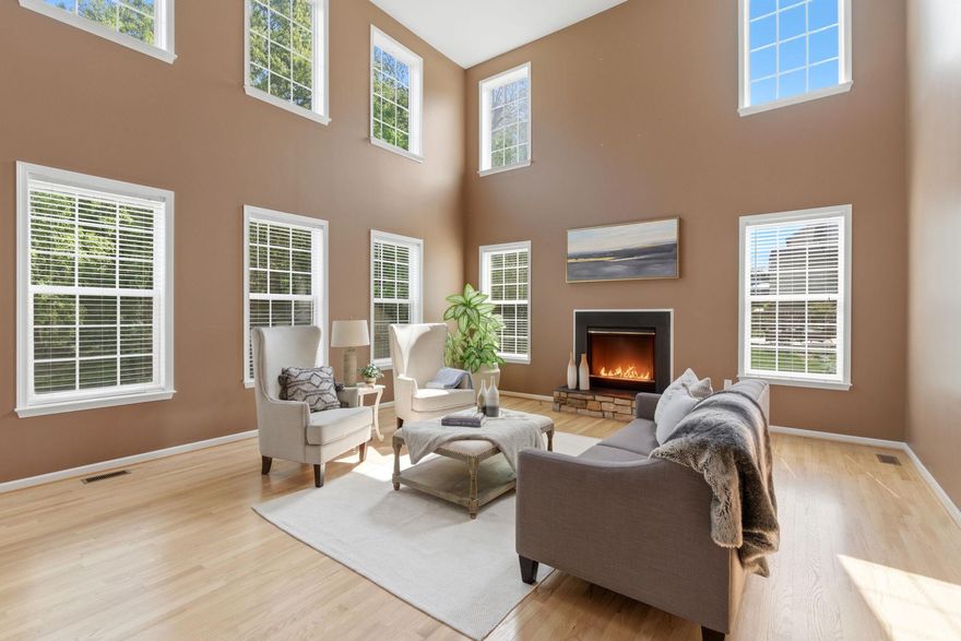 Don’t let the exterior fool you—this is the largest model in the neighborhood, offering an incredible amount of space and openness that truly has to be seen in person to be appreciated. 
Welcome to 457 Hughs Rd, a spacious three-level single-family home offering 5,166 total square feet, including 3,566 square feet above grade. Featuring 4 bedrooms and 4.5 bathrooms, this property offers exceptional interior space, a functional layout, and recent system updates.
From the moment you enter the front door, the home creates a strong first impression with its expansive feel, enhanced by vaulted ceilings and an open layout that brings in natural light. The main level includes a living room with a fireplace that serves as a comfortable central gathering space. Newly sanded and refinished floors add a fresh and updated look throughout. The kitchen has been updated with new countertops and provides direct flow to the surrounding living and dining areas, supporting both everyday living and entertaining. A dedicated office on the main level offers flexibility for remote work or additional use. There is also walk-out access to a refinished deck that overlooks the private, tree-lined backyard.
The upper level includes generously sized bedrooms, including two ensuite bedrooms, providing added privacy and flexibility for guests or multi-generational living. Multiple full bathrooms on this level enhance convenience and functionality.
The finished lower level adds significant additional living space suitable for a recreation room, home theater room, home office, fitness area, or guest accommodations.
Recent improvements include a new heat pump in 2025, roof in 2018, new refinished flooring, new kitchen countertops, and a new front entry door. These updates contribute to improved efficiency, reduced maintenance, and long-term value.
Situated on a 0.23-acre lot, the backyard is lined with mature trees that create natural privacy. Additional features include a two-car garage and three finished levels of living space.
The location offers strong convenience, situated minutes from Route 340 and Route 9, walkable to Washington High School, and within commuting distance to Washington, DC and Northern Virginia. Come to the open house, or call for a private tour today!!