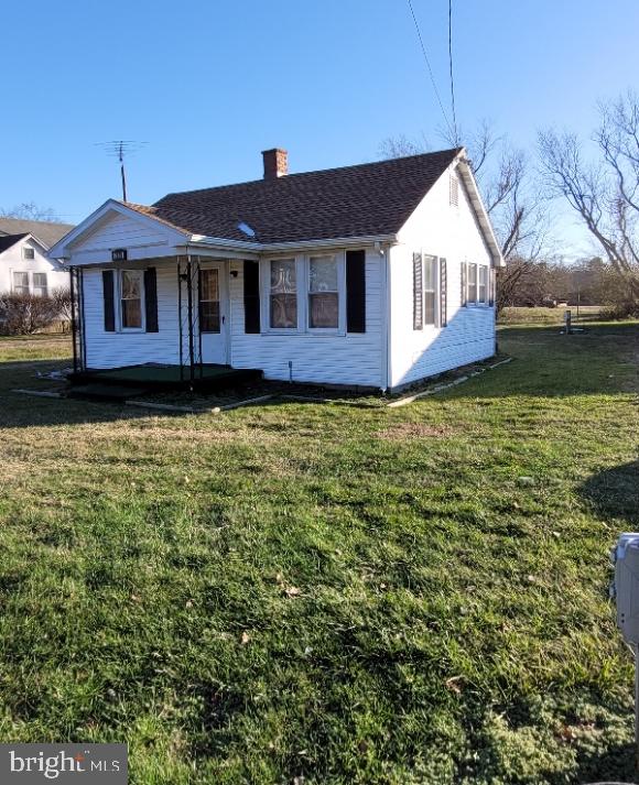 Looking for a great investment piece? Here's a great opportunity to own prime commercial real estate with US Rt.50 access. Just shy of a quarter acre property with over 30,000 cars passing by each day. This would be an ideal property for a tradesman or business owner looking for a high visibility location. OR affordable housing for an employee while the additional yard is utilized as storage space for vehicles and/or materials. House features a functional floor plan, 1-2 bedrooms, laundry/utility room, and spacious kitchen. LVP floors in living room. New furnace in 2023. Roof installed in 2017. Public water & sewer. Prior tenant paid $1340/mo. Buyer to confirm all possible uses with city planning and zoning- zoned general commercial.