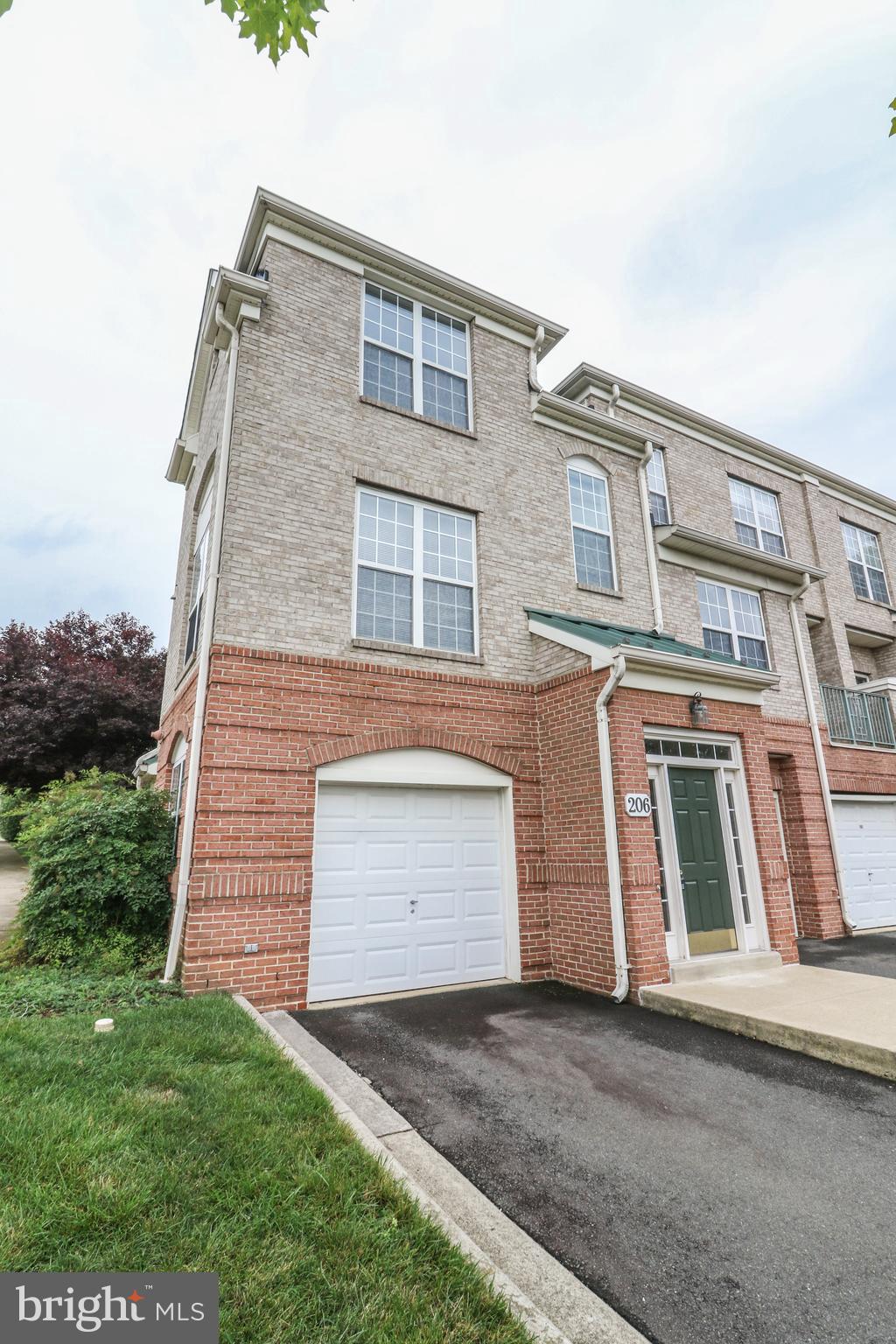 Welcome to this charming end unit townhome-style condo that offers both comfort and convenience. With its one-car garage and direct entry, this 3-level abode provides a seamless living experience. As you step inside, you're greeted by a ceramic tile entry foyer that sets the tone for the tasteful design throughout.
The main level boasts hardwood floors that flow through the open living space. Natural light pours into the living room, which features a ceiling fan, crown molding, and a warm ambiance. Adjacent to the living area, the dining space is adorned with crown molding and a chair rail, creating an inviting atmosphere for meals and gatherings.
A thoughtfully placed powder room on the main level adds convenience, while the dedicated laundry area with full-size machines and shelving ensures practicality without compromising on space.
The well-appointed kitchen is a culinary enthusiast's dream, featuring stainless steel appliances, Corian countertops, and a pantry for ample storage. It effortlessly caters to your cooking needs while maintaining an aesthetic appeal that complements the home's overall design.
Unwind and relax in the cozy family room, complete with a gas fireplace that provides both comfort and character. With a ceiling fan to keep the air flowing and access to the balcony, this space is perfect for unwinding or entertaining guests.
Retreat to the primary bedroom, a true haven with multiple closets, a ceiling fan, and an en-suite bath. The primary bathroom offers a serene escape with its separate tub and shower, catering to your preference for relaxation.
The secondary bedrooms on this level are designed with comfort in mind, featuring carpeting and ceiling fans to ensure a pleasant atmosphere.
One of the standout features of this property is its fantastic location. Situated within walking distance of Reston Hospital, Reston Town Center, and major transportation hubs, you'll have easy access to medical facilities, shopping, dining, and commuting options.