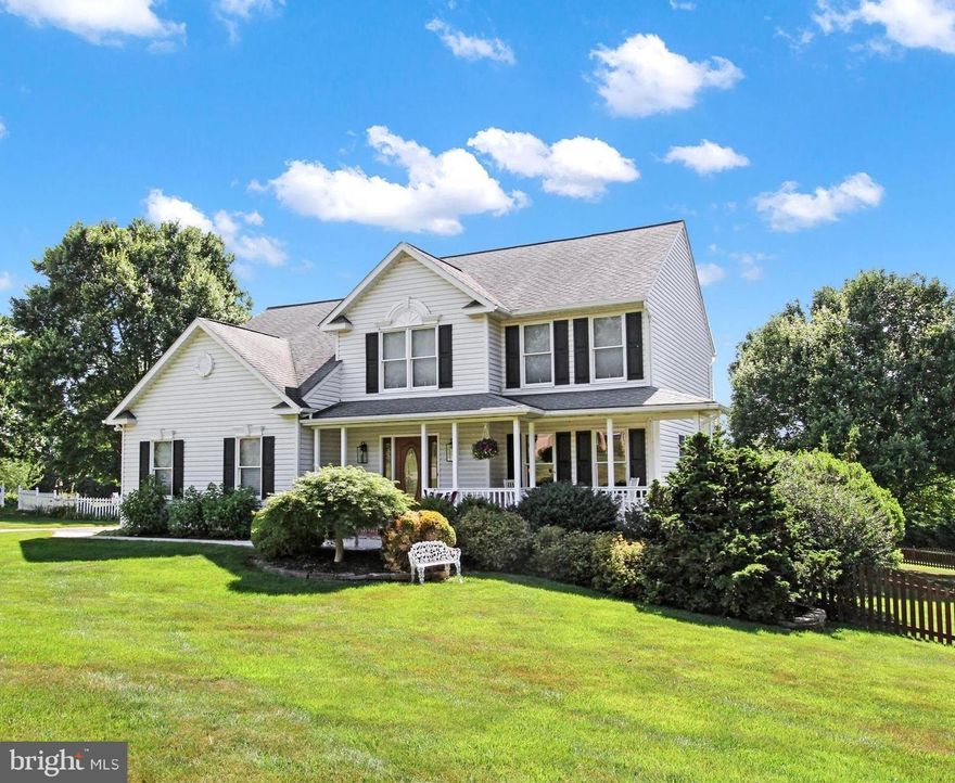 Welcome Home!  2900 Pelham Court provides spacious comfort and convenient location all in a quaint neighborhood setting. This inviting 5 bedroom Colonial-style home rests on a generous 0.79-acre corner lot with a fully fenced backyard.  Traditional layout greets you at the foyer, with laminate plank flooring throughout the main level, a spacious formal living room and dining room to your right; and just ahead, the kitchen which opens to the breakfast room and family room with gas fireplace.  Recently installed granite counters shine in the light from the abundant windows.  The laundry room greets near the spacious 2 car garage.  Upstairs houses the Primary Suite with full shower and tub bathroom and walk-in closet, 3 additional spacious bedrooms, and a full hall bath.  The partially finished basement offers a third full bath as well as a nicely sized 5th bedroom with full window and walk-in closet, and a rec room with a small bar and mini fridge.  Storage is no issue with an ample unfinished space in the basement as well. Outside, enjoy the bi-level deck and fully fenced mostly flat backyard.  Scheduled your showing today this home won't last long!