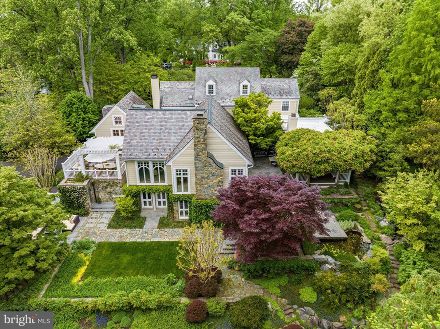 SIGNIFICANT $285,000 PRICE IMPROVEMENT to this exquisite, fully renovated and expanded Bannockburn residence that epitomizes luxury and sophistication. Situated on an expansive one-acre corner lot, this 6 BR/6.5 bath home resides within the highly sought-after Whitman High School cluster.

A main level primary suite offers a true haven for relaxation and tranquility. Thoughtful upgrades throughout the property further enhance its allure, including Lutron automated lighting, a full house generator, and elegant chef’s kitchen.

Designed to accommodate seamless indoor-outdoor living, this residence also offers a lower level kitchenette to service the lap pool and multiple outdoor terraces. An expansive deck off the kitchen, adorned with a stylish pergola, creates an idyllic setting for al fresco gatherings.

A main level office/library provides a refined space for work or study, while the living room and kitchen exude an air of grandeur with their striking cathedral ceilings. Impeccable craftsmanship and custom built-ins and storage solutions add elegance and functionality throughout.

A mature tree canopy, specimen plantings, and enchanting features such as a 60 ft lap pool and koi pond invite you to unwind or entertain guests across multiple terraces and balconies.

Offering an abundance of space, the three-car garage easily accommodates your vehicles and additional equipment, catering to the needs of an active and sophisticated lifestyle. The property's unparalleled location provides convenient access to several commuter routes to Washington, D.C., as well as three major airports.

This exceptional offering, available for the first time in nearly four decades, combines timeless elegance, superior craftsmanship, and an unbeatable location.