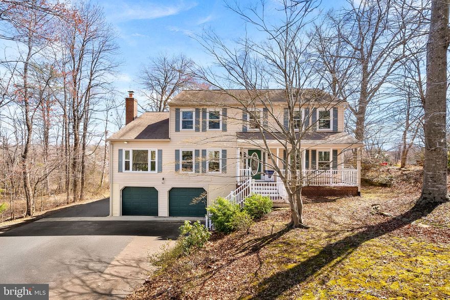 Welcome to 1339 Aquia Dr, a 3,700+ sq ft home situated on one of the  best premium lots in Aquia Harbour! Thoughtfully renovated for its new owner, this home offers modern updates, functional space, and a desirable location within the community.The home welcomes you with excellent curb appeal and a long, wide front porch—perfect for relaxing or enjoying morning coffee. Inside, fresh paint and modern finishes create a clean and inviting feel. The main level features crown molding and LVP flooring throughout, along with a formal living room, large family room, gourmet kitchen, breakfast sitting area, designated dining room, powder room, and a main-level bedroom that can also function as an office.The gourmet kitchen includes tray ceilings, quartz countertops, and brand-new stainless steel appliances, including a 5-burner cooktop with a range hood, dishwasher, and a built-in microwave/oven combo. Just off the family room is a spacious sunroom with large arched windows and vaulted ceilings, bringing in plenty of natural light. The sunroom leads to an oversized screened-in deck, offering a great space for relaxing or entertaining while overlooking the long, flat, fenced backyard—one of the standout lots in Aquia Harbour.Upstairs you’ll find four generously sized bedrooms and two full bathrooms. The primary suite features LVP flooring and a spa-style bathroom with a large soaking tub, frameless glass shower, and double vanities. The remaining three bedrooms feature brand-new carpet. The upper level also includes a spacious hallway bathroom and a separate laundry room for added convenience.The finished lower level offers LVP flooring, a full bathroom, and an open recreation area with flexible use for entertainment, a home gym, or additional living space. The home also provides ample parking with a large paved driveway and a front-loading two-car garage.Other key upgrades include: fresh paint (2026), new carpet (2026), freshly stained front porch (2026), freshly painted kitchen cabinets (2026), new water heater (2025), new kitchen appliances (2026**Will be installed prior to settlement**), quartz countertops (2025), and new LVP flooring (2022), a power-washed exterior (2026) and more!Aquia Harbour is a gated community, and this home is conveniently located just a three-minute drive from the main entrance for easy access for residents and guests. Community amenities include a marina, kayaking, pools, a country club, golf course, restaurant, walking trails, community center, tot lots, playgrounds, and an on-site police department for added safety and security for residents. The home also offers convenient access to shopping, restaurants, and major commuter routes including I-95 and Route 1.Scheduled to hit the market on March 17th. Schedule your showing today!