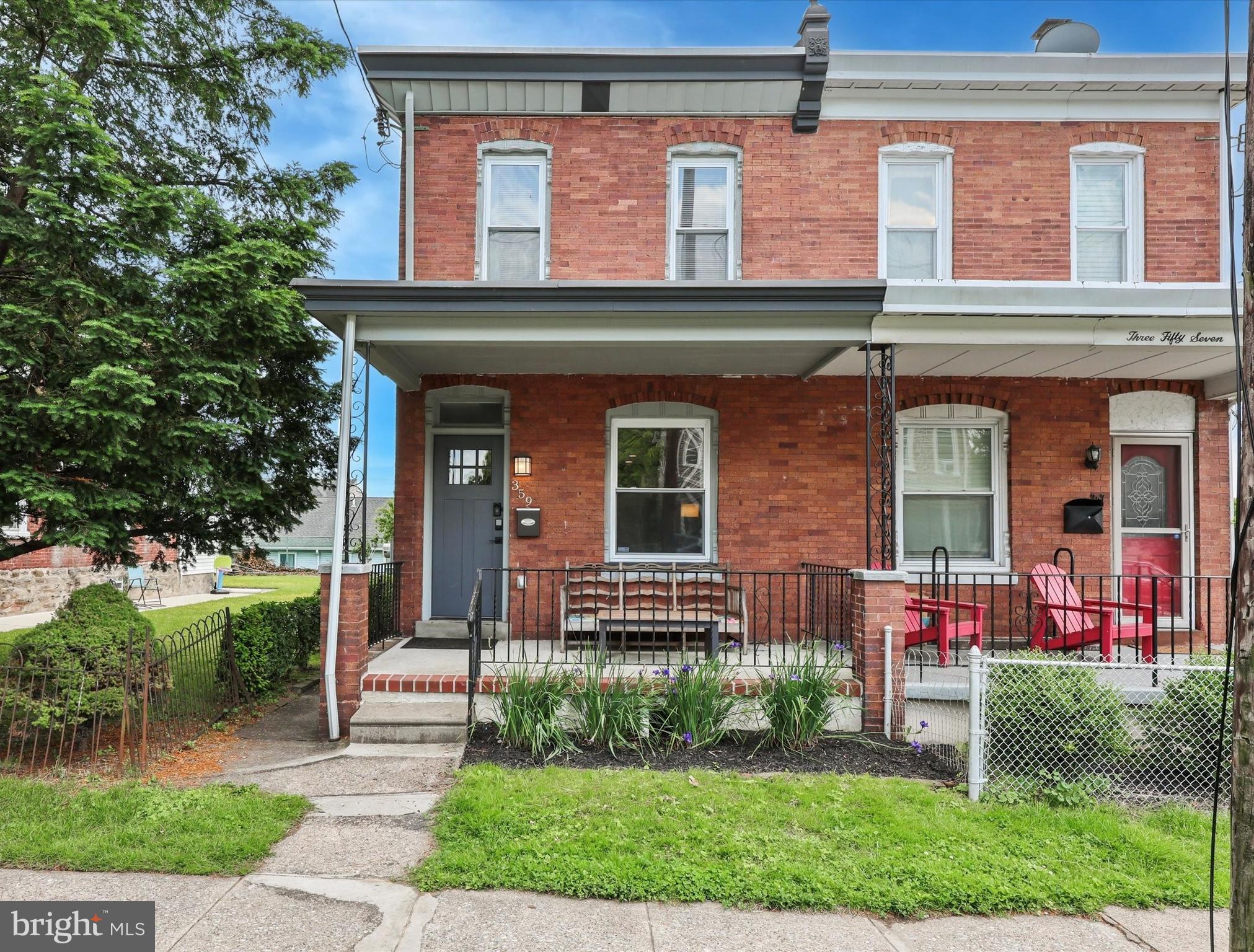 Located on a lovely, quiet and walkable street, with ample parking, this home is just steps from Gorgas Park, local shops, trails, and public transportation, with easy access to Center City, King of Prussia, the Blue Route, and nearby colleges, this home offers the ideal combination of comfort, style, and convenience. Move right in to this FULLY renovated 4-bedroom, 2.5-bath brick twin, that offers a perfect blend of modern updates and classic charm. This home features an inviting covered front porch, a stunning open-concept floor plan designed for today's lifestyle as well as a great rear yard space! Step inside to find engineered hardwood flooring, exposed brick accents, coffered box ceilings, and recessed lighting throughout the main level. The spacious living room boasts a color-changing electric fireplace set against a dramatic stacked stone wall—ideal for cozy nights or entertaining guests. The gourmet kitchen is a showstopper with a 10-foot quartz island seating four, white shaker cabinets with soft-close drawers and doors, quartz countertops, subway tile backsplash, built-in microwave, and stainless steel appliances, all illuminated by three elegant pendant lights. Adjacent is the dining area, which features a full exposed brick wall and a barn door that leads to a convenient laundry room, powder room, and access to the fenced rear yard—perfect for outdoor living. Upstairs, the second level offers three bright bedrooms with high ceilings and recessed lighting, plus a beautifully updated hall bath with ceramic tile and a tub/shower combo. The third level is dedicated to the private primary suite, complete with a walk-in closet, a luxurious full bath featuring a glass-enclosed shower with a rainforest shower head, and a bonus storage area. The finished basement adds even more living space, along with a newer waterproofing system and two additional storage areas. Be sure to check this one out!