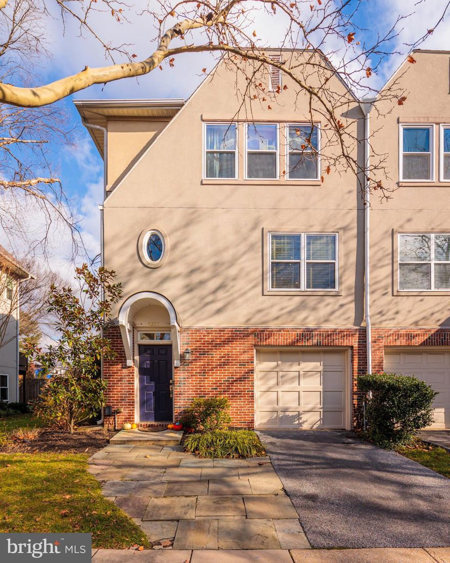 Welcome to the Village of Homeland East, a Gated community with a pool!! This bright end of group townhome is ready for the new owners. On the entry level, the home features a grand piano room with a fireplace, custom built-ins and a walk-out to the patio. This space could be easily turned into an additional bedroom or a family room.
Second floor offers hardwood floors throughout, a large updated eat-in kitchen, powder room and a cozy living room area with a wood burning fireplace and a walk out to the terrace, perfect for grilling or quiet enjoyment of your morning coffee.

Upper floor features 3 bedrooms and 2 bathrooms, including an n-suite with a walk-in closet, a large bathroom with a walk-in shower, soaking bath and heated floors. 

 The HVAC system was replaces in 2021. There is plumbing hookup for a powder room in one of the closets at the entry level as well.