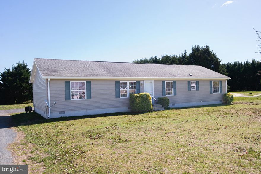 Looking for more space? This 4 bed, 2 bath home situated on .99 acres offers separate  living and family rooms, new paint, new flooring in living spaces and bedrooms. Enjoy the country-living from the screened gazebo and deck. Centrally located between Easton, Cambridge and Seaford.