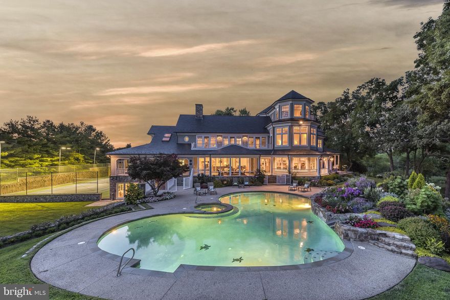 Gracious 6.42 acre oasis set on the Chesapeake Bay. Impeccable architecture embraced by private beach, freshwater pond, indoor and outdoor pools. Resort amenities include racquetball and tennis courts, climbing wall, zip line, deep water slip.  6 BRs, 6 full & 2 half baths with elevator. Main level guest suite. Water view screened porch. Do not enter private road without appointment!