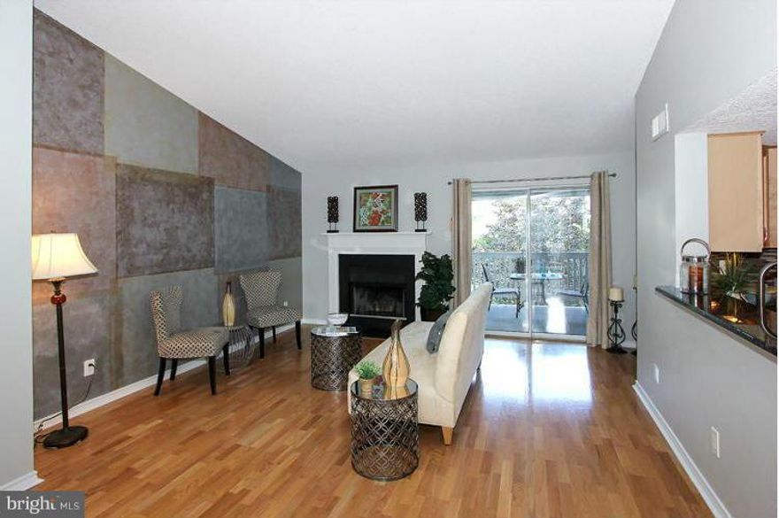 Back on Mrkt. Went under contract in 2 days; financing fell through.Your 2nd chance!!Stunning 2 Master/2 Bath +2 parking spaces! a 20K value+ Near METRO! Gorgeous,decorator upgrades throughout.Cathedral ceiling,full HWD floors.Designer kit w/ NEW Granite.glass-tiled backsplash, New SS sink; fixtures; Beautiful Updated Bths w/ NEW Granite;lighting, sinks,fixtures w/ gleaming glass doors;2 decks!