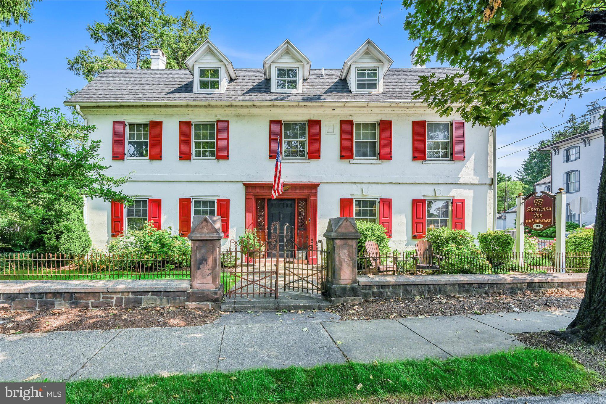Entrepreneurs, business owners and adventurers, take a look at this once in a lifetime opportunity to own a piece of old world charm and history in the heart of beautiful Ephrata, Lancaster County!
The current owners continued this long established B & B known as 1777 Americana Inn in 2014 and since then have added a ton of improvements without taking away from its charm and character! The historic, more than 200-year-old structure that once served as a stagecoach stop, restaurant, and hotel throughout its history has become a popular destination!
In addition to the main inn, the property also contains a detached cottage with 5 Guest Rooms as well as the adjacent building that is designed in the same period style known as the Black Forest Brewery.
The main inn also has a separate owner’s apartment and beautiful multiple outdoor patios. A private parking lot on a separate included lot (0.14 acre) is located across Museum Alley conveniently offering 16 additional parking spots to be used by the Inn’s guests.
The 1777 Americana Inn, the cottage and the brewery are situated within walking distance to the historic village and its community events happening throughout every season of the year making it a lucrative yearlong business opportunity.
Guests can spend a weekend and never have to move their car.
The craft brewery offers many uses and loads of potential to start a new business adventure. It has a seating capacity of 70, 50 of which are indoor and 20 on the outdoor patio.
All three buildings (main inn, detached cottage, and brewery) provide a combined 8,196 square feet of gross building area.
But… if you’re just looking to invest in real estate, this is a beautiful 8-9 unit in a fantastic location for long-term tenants plus a start-up or existing restaurant/cafe.