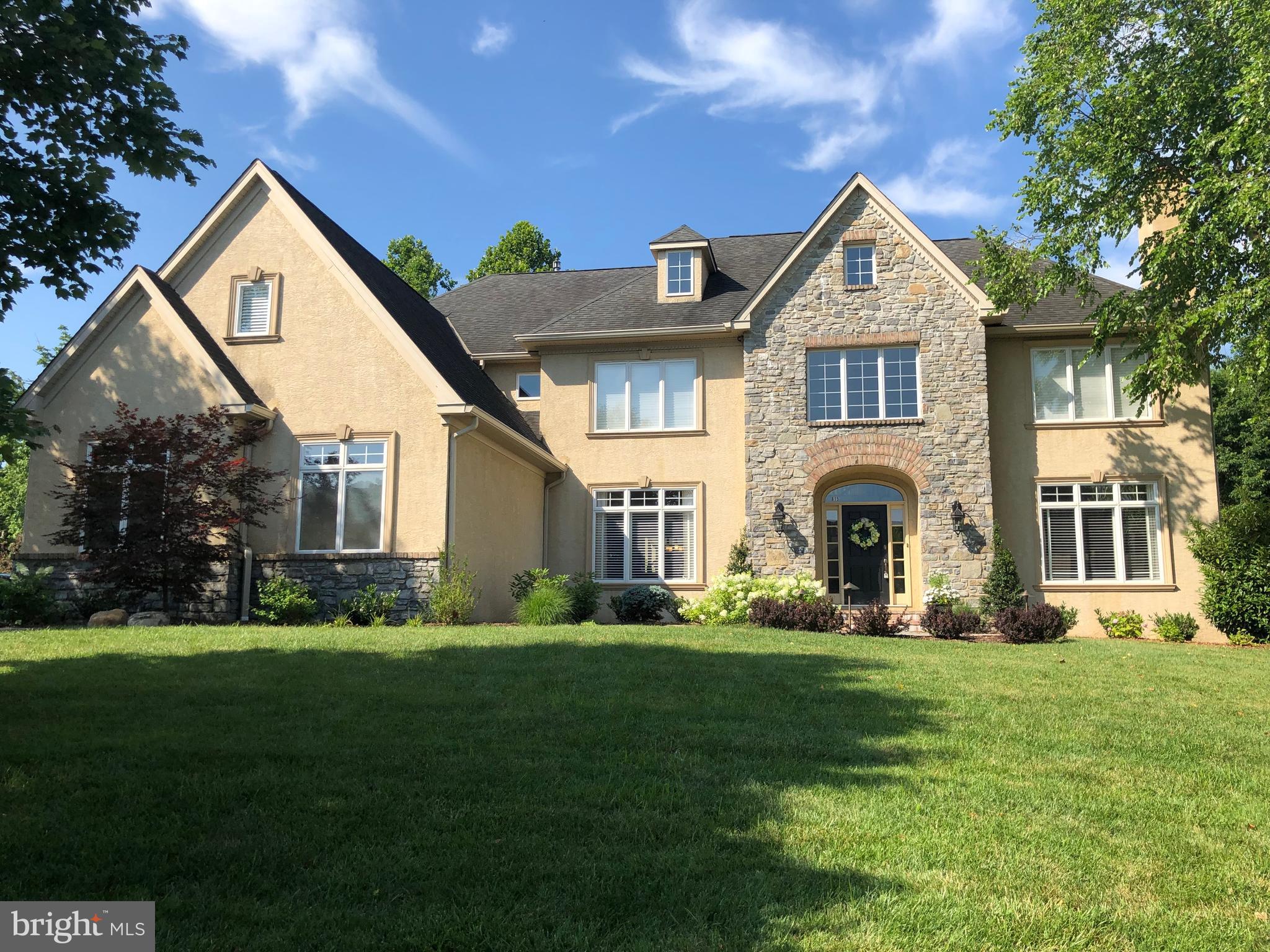 An Impressive "NEW" Price for this extraordinary "SPRING HOUSE FARM" masterpiece-!! Very infrequently does a home such as this become available in the heart of Lower Gwynedd.... If you have been searching for the perfect blend of elegance with a warm and welcoming feeling you have just arrived at your "New Home" that is now offered at an remarkable price! This magnificent Guidi built home will be the home of your dreams! As you arrive you will be impressed with the NEW brick and bluestone walkway surrounded with attractive professional landscaping and lighting. Enter the home into grand 2 story foyer and you will find great attention to detail- meticulous workmanship and quality design features throughout. The newly finished gleaming hardwood flooring is throughout the entire lst floor-along with an abundance of crown moldings and trim details. The living and dining rooms are beautifully appointed and filled with natural light- Family Room with vaulted ceiling- and open view from 2nd fl overlooking this wonderful gathering space is breathtaking! Magnificent custom-built wall unit, Wall of windows enhanced with NEW Plantation shutter and fireplace with stone surround complete the inviting setting. Adjoining Gourmet Kitchen with cherry cabinetry and stainless appliances are the epitome of classic elegance-! Family and friends are sure to find this Heart of the Home so welcoming! The covered patio connects to the kitchen/breakfast area and will be a tranquil setting to enjoy dinner and relax while viewing the magnificent surroundings of this rear of the home. Classic charm continues into the Study/Office and Powder Room. The 2nd floor will welcome you to 3 generously sized bedrooms, One with private bath- Hall bath that has been completely remodeled and a Main Bedroom suite that continues with classic charm and NEW Hardwood flooring, Wonderful sitting room and a incredibly well designed spacious walk in closet with a grand bath- jetted tub, his/her vanity & stall shower complete this suite- The lower level will be a wonderful place to personalize for your family needs! Consider an additional family room- Game Area and/or gym area Lots of unfinished space for storage too! The outdoor living space will take your breath away ! No expense was spared with the NEW Anthony/Sylvan saltwater pool that is less than 2 years old- heated with spa is surrounded with travertine decking- amazing NEW landscaping and Chef s delight outdoor grill- Your family and friends have found their new favorite spot to enjoy summer fun! This amazing home is in immaculate condition ..Pride of ownership will be apparent from the moment you enter. In addition to the features of this fabulous home you will surely also enjoy the prime location ! Convenience of local shopping- New Whole Foods, Trader Joes and lots of boutique stores as well- Within minutes of the renowned Horsham YMCA- seconds from Rte 309 and Pa TPK. Convenient to so many areas yet all nestled into a private wooded setting. Best of all worlds !!!! If you deserve the finest------ You have arrived at your New Home!