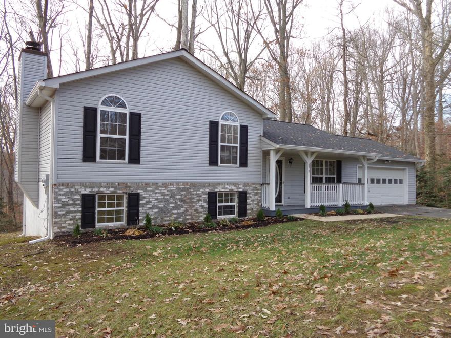 JUST MOVE IN & RELAX--IT'S ALL BEEN DONE FOR YOU! FROM THE GLEAMING WOOD FLOORS TO THE LUXURIOUS TILE TO THE SHINY STAINLESS APPLIANCES & GRANOITE COUNTERS, YOU'LL BE IMPRESSED! GATHER WITH FRIENDS IN THE LARGE LIVING ROOM OR RELAX IN THE BIG FAMILY ROOM...ENJOY A FORMAL MEAL IN THE DINING ROOM OR SOAK IN THE SUN ON THE BACK DECK...KEPP BOTH CARS WARM & DRY IN THE DOUBLE GARAGE...SEE FOR YOUSELF!