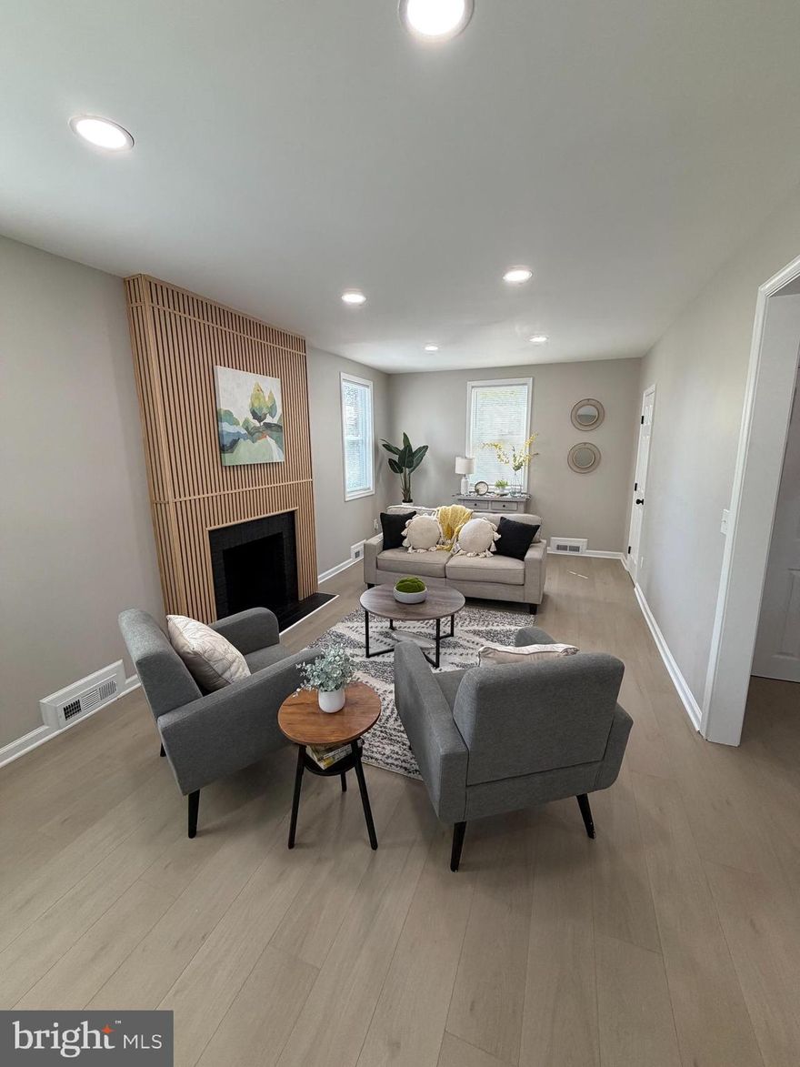 Welcome home! This is the house you’ve been waiting for. This beautifully renovated home features a new roof, new windows, updated flooring, stainless steel appliances, and much more.. Every detail in this home has been thoughtfully designed with a modern, on-trend aesthetic, creating a stylish interior that truly stands out.

As you enter, you’re welcomed by an open layout. To your left, you’ll find a formal living room highlighted by a stunning accent fireplace, along with a conveniently tucked-away half bathroom. To the right, enjoy a spacious kitchen and dining area—perfect for everyday living and entertaining. The kitchen boasts brand-new stainless-steel appliances, expansive quartz countertops, and ample storage with 42-inch cabinets.

Upstairs, you’ll find a generous primary bedroom complete with its own private bathroom. Two additional bedrooms and a full hallway bathroom provide plenty of space for family or guests. Natural light fills the home, creating a warm yet modern and inviting atmosphere.

The fully finished basement offers a large entertainment area, plus an additional room ideal for a home office or guest space, complete with its own closet and a thoughtfully designed full bathroom. The walk out basement offers convenience and flexibility to a private backyard.

Step outside and imagine relaxing on the front porch or deck, enjoying time with family and friends. Located in a quiet and welcoming neighborhood, this home is just minutes from shopping, major highways, and nearby retail centers.

Don’t wait—schedule your showing today, this home won't last long!