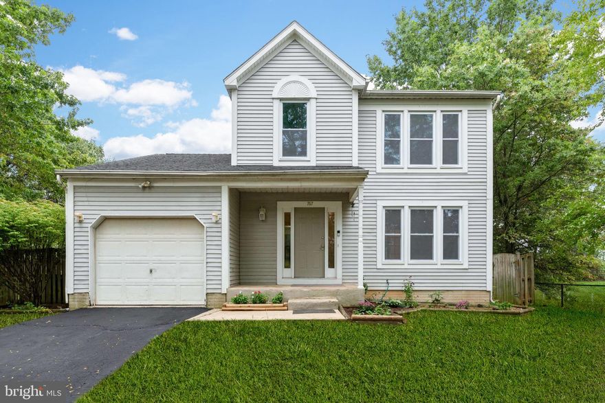 Welcome Home! Well maintained Colonial home with to many wonderful qualities to mention them all but here are a few.   A large front porch, attached garage, sliding door to deck off the family room  and leveled fenced backyard. The flow of this move-in ready home is absolutely perfect. You'll appreciate the large living room and separate dining room. Boasting an open concept kitchen and family room with vaulted ceiling and cozy fireplace.   Three finished floors of living space, with three full bathrooms and half bath on the main level.  Three bedrooms on the upper level and a second family room and two large bonus rooms on the lower level.  The main level has a formal living room with french doors to the formal dining room.  The  huge eat in kitchen  opens to the main floor family room with sliding glass doors to the over size deck.  This home is ready for your family holiday parties! Call for your private showing today.