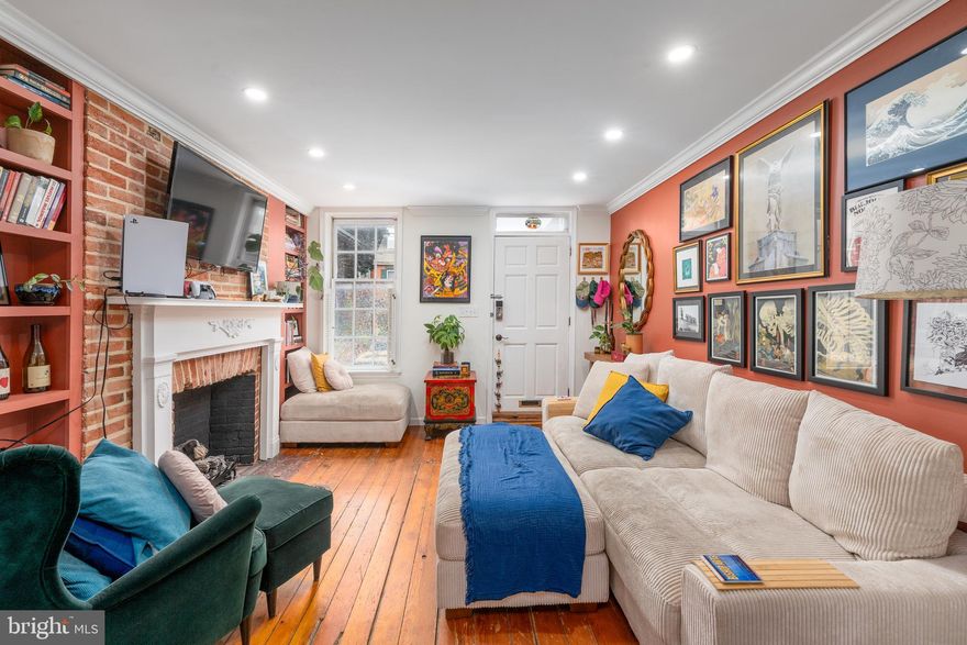 Discover the perfect blend of historic charm and modern updates in this 3-bedroom, 2-bath home in the heart of Federal Hill! Featuring beautifully refinished original hardwood floors, exposed brick accent walls, 1800s fireplace mantels, built-ins, a formal dining room, and a spacious eat-in kitchen with a built-in desk area. The kitchen also boasts a brand-new Samsung 27 cu. ft. Bespoke French Door refrigerator (2024).

Upstairs, the second level offers two generous bedrooms flanking a fully renovated center hall bath and access to a delightful private deck. The entire third level serves as a private owner’s suite with a large bedroom, office/reading nook, updated bath, and abundant closet space.

Additional highlights include a finished basement with in-unit laundry, a private rear PARKING SPACE, and major system upgrades: new HVACs and furnace installed in 2024.

All this just steps from local restaurants, shops, and nightlife, plus Federal Hill Park and the Inner Harbor. An easy commute to the University of Maryland, Johns Hopkins, the Baltimore Business District, and commuter routes I-95, I-295, and I-83.