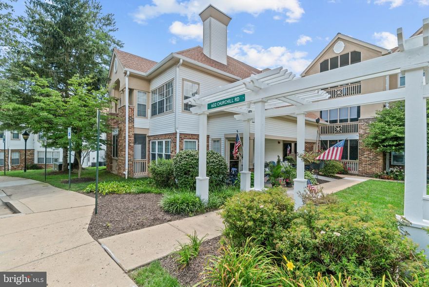 Welcome to resort-style living in the heart of Bel Air! This stunningly updated 2-bedroom, 2-bathroom condo with a den in the sought-after English Country Manor is truly one-of-a-kind. From the moment you step inside, you'll be captivated by the rich hardwood floors, crown molding, and thoughtful designer touches throughout.

The gourmet kitchen boasts granite countertops, stainless steel appliances, tile backsplash, a breakfast bar with stylish pendant lighting, and opens seamlessly into the formal dining area—perfect for entertaining. The spacious living room features crown molding, recessed lighting, and flows into the versatile den through elegant double barn doors. The den offers a ceiling fan and access to both the screened-in balcony and walk-out deck—ideal for enjoying peaceful views of the wooded backdrop.

The expansive primary suite is a serene retreat, featuring a walk-in closet (currently converted into a nursery), ceiling fan, French doors to the balcony, and a luxurious en-suite bathroom with a river stack stone accent wall, soaking tub, and tile-inlay surround. The second bedroom is light-filled with a ceiling fan and access to the den, while the updated hall bath stuns with a glass-enclosed shower, custom tilework, built-in niche, and body jets.

Enjoy the ease of private laundry and the comfort of a walkout-level unit that feels like a private oasis. All this plus the amenities of English Country Manor—community pool, fitness center, clubhouse, and beautifully maintained grounds. A must-see!