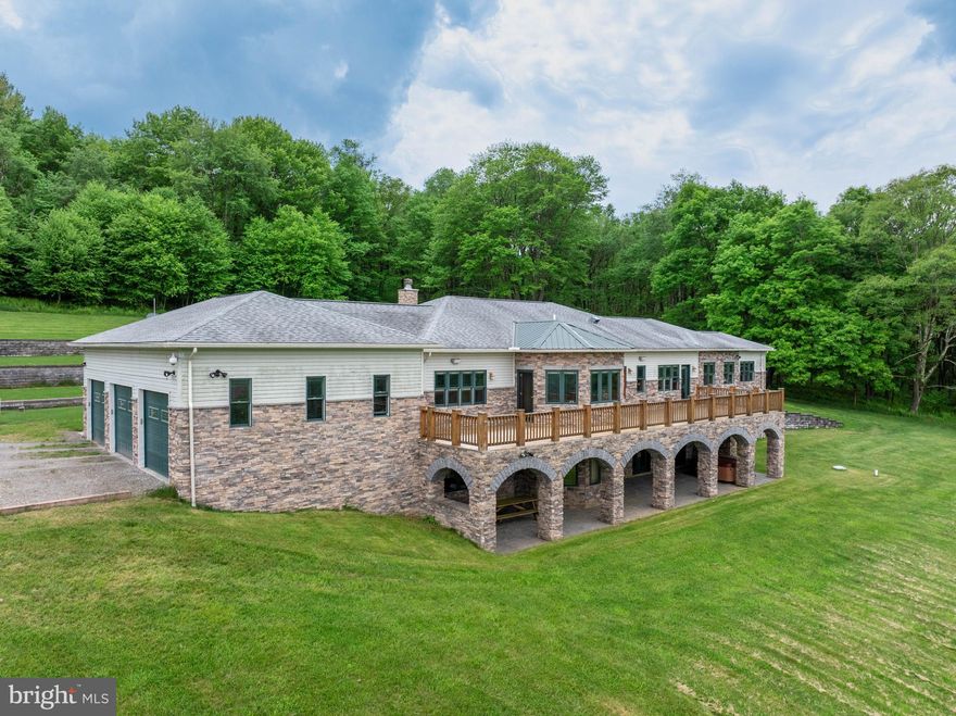 Check out this incredible opportunity to own a truly beautiful West Virginia Estate and Farm! Gaze over your 201+ acres with unimpeded pastural and mountain views from the 7,800+ square foot custom built and designed home. Located just 13 miles from Wisp Resort and Deep Creek Lake the land is approximately 60/40 fully fenced in farm and wooded acreage. The property offers sprawling views, peace, and privacy to it's new owner while being a stones throw from area attractions.  The home, thoughtfully custom built and designed in 2010, currently offers 5 Bedrooms, two of which are primary bedrooms, and 3 1/2 bathrooms with plenty of room to expand! Stunning Cherry hardwood floors and cabinetry appoint the main level and custom gourmet kitchen featuring quartz countertops, commercial grade appliances, built-in appliances, radiant floors, and toe kick central home vacuuming system. Additional features include:  a Generac brand whole home generator electric back up system, Wood burning living room fireplace with propane starter, 9' ceilings on all levels with beautiful tray ceilings and recessed lighting, Pella windows  and French doors providing plenty of natural light on all levels, An 11 zone Geothermal cooling/heating providing efficient temperature control all times of year, outdoor hot tub, wine cellar, huge amount of storage space with a Three car attached garage with it's own heating, a 48'x32' pole building with water, electric, automatic doors, and fuel pumping station. Lower level integrated garage/hobby room. Massive Utility/storage and canning/craft room and exercise room.  Lower Level has been designed with utilities run to easily be converted into a mother in law suite/ apartment with separate kitchen and laundry room. The list of thoughtful design and layout is extensive, see documents for additional amenities and features. Call today to schedule a showing before this one is gone!
