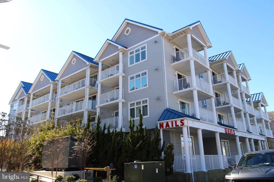 A rare find to be a part of the magic and excitement of the downtown boardwalk area, inlet, and vast open beach area. This beautiful large 1548 sf 3br/2ba unit has secured entry to the building as well as convenient access to the outdoor pool. Ceramic tiled entry leads to 2 of 3 carpeted bedrooms and tiled laundry room with full sized washer & dryer. Entering the updated kitchen area has recessed lighting, stainless steel appliances, granite counter tops and adjacent eating counter seating 4. The adjacent dining area also seats 4. The spacious carpeted living room allows for comfortable seating for 7 with 2 sofas (1 that is a sleep sofa) and an additional chair and cozy fireplace for chilly evenings. Glass sliders open to the spacious balcony. Large carpeted master bedroom has a walk-in closet and sliders accessing the large balcony. Spacious master bath features 2 sink vanity, glass enclosed shower and soaking tub. This property is a block from the boardwalk and beach, with outdoor pool, and very close to numerous restaurants and entertainment. Original owners, unit has never been rented. Rental potential in Bel Mare of $30,000. Two car assigned parking and storage locker.  One year home warranty