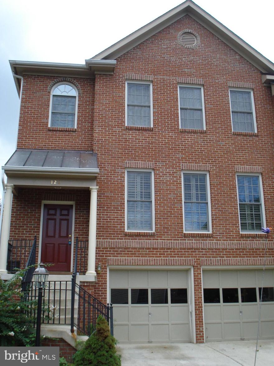 This great 3-storey end unit town home offers a 2-car garage, fenced rear yard, and a spacious rear deck. Upon entering, you'll find a convenient coat closet with steps leading up to the good-sized family room. Flooded with natural light, the room features a gas fireplace and provides access to the formal dining area. You’ll also find an office or bonus room with built-in units, along with a half bathroom nearby. The kitchen, complete with stainless steel appliances including a gas stove, microwave, side-by-side refrigerator/freezer, and dishwasher, boasts ample space for a table and doors that open to the rear deck. Gleaming hardwood floors cover the main level, enhancing the home’s appeal. Upstairs, the primary bedroom features a bathroom equipped with a soaking tub, a vanity with double sinks, a separate shower, and a linen closet. Two additional bedrooms and a full hall bathroom round out the upper level, where you'll also find the laundry closet conveniently located in the hallway. The finished basement, carpeted like the upper level, includes a fireplace and a full bathroom. 
The home is located in proximity to the beautiful Downtown Warrenton, with shopping and dining.