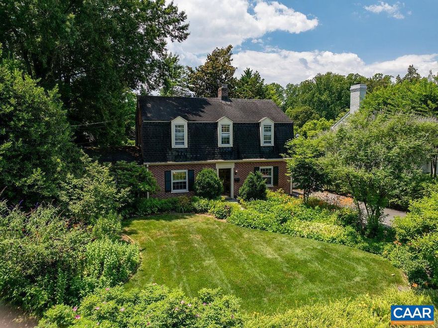 This classic and cozy Dutch Colonial, nestled in the coveted Rugby neighborhood, is ready for its next owner?s vision. Expansive common spaces on the main level provide ample room for entertaining, including formal dining, living room, family room, eat in kitchen, and a sunroom serving as the perfect perch for enjoying nature. Upstairs are a large primary suite with bathroom and ample walk-in closet space along with three more bedrooms and full bathroom. Large patio off the sunroom overlooks the nearly level yard and provides a wonderful space for entertaining and play. Off street parking and one car garage. Finished studio shed in the back yard could serve as an ideal office or relaxation spot. Great proximity to UVA, Downtown Mall, Dairy Market, and just 20 minutes from the airport.,Granite Counter,Fireplace in Family Room,Fireplace in Living Room