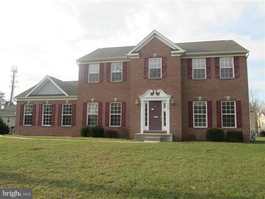 Brick Front Colonial w/Side Load Garage. Just Like New and waiting for a new owner. Very neutral decor. Country Kitchen has center island and opens to Family Room w/Gas Fireplace. Powder room on main level. Master Bedroom w/Cathedral Ceiling, Walk-In Closet & Super Bath. Upper level has 4 bedrooms and 2 baths. Finished Basement with Rec Room, Den and Full Bath. Walk out stairs through sliders.