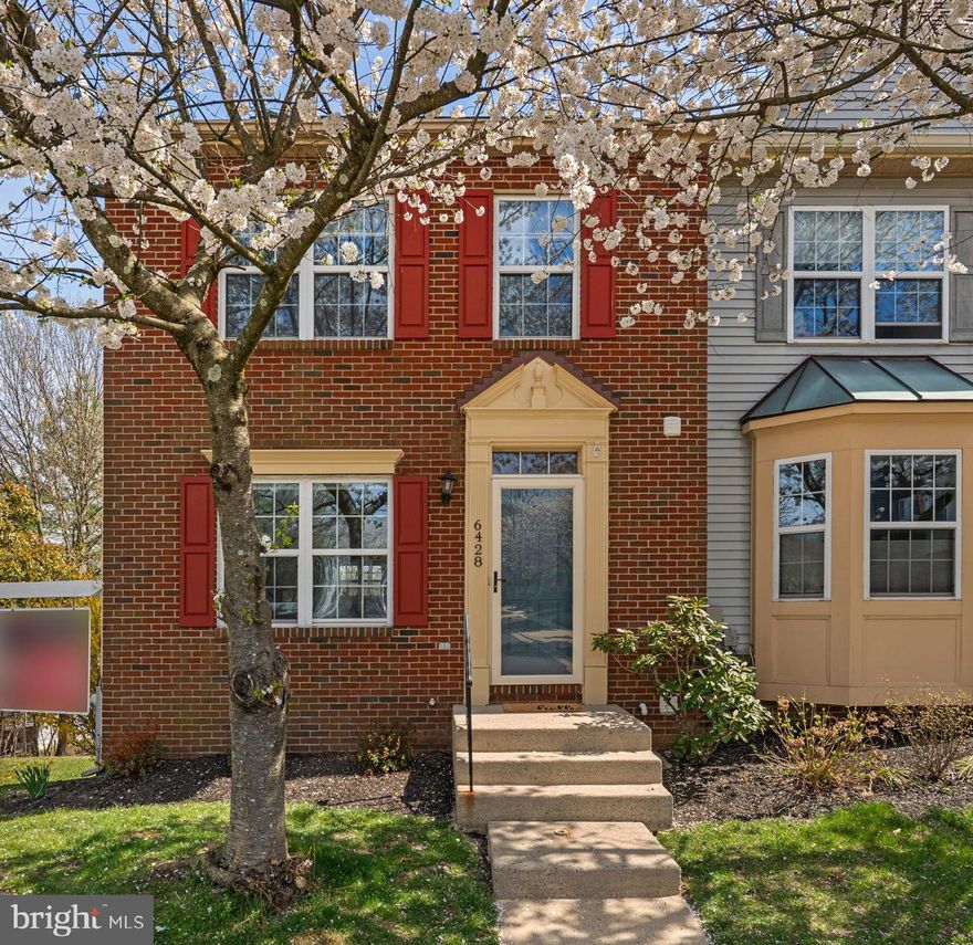 Welcome to 6428 Frothingham Court—a BEAUTIFUL end-of-group townhome offering privacy, space, natural light, and thoughtful updates in the highly sought-after Elkridge neighborhood of Willowood.  Step inside to a welcoming foyer that opens to a bright and spacious main level, featuring beautifully refinished hardwood floors that extend throughout both the main and upper levels. The layout flows seamlessly from the living room into the formal dining area and beyond, into the open, eat-in kitchen.  The kitchen is well-appointed with granite countertops, stainless appliances, a center island, ample cabinetry, and a breakfast area that opens directly to the deck—perfect for outdoor dining or relaxing while enjoying the peaceful, tree-lined backdrop.  Upstairs, you’ll find three generously sized bedrooms, including a spacious primary suite with vaulted ceilings, a walk-in closet, and a beautifully renovated primary bathroom featuring a dual sink vanity, a soaking tub and a separate, oversized walk-in shower. Two additional bedrooms and a full hall bathroom plus a linen closet complete the upper level.    The walkout lower level adds valuable living space with a comfortable family/rec room that leads directly to the patio and backyard, offering a seamless indoor-outdoor connection. This level also includes a full bathroom , a dedicated laundry area, utility room, and additional storage space.    As an end-unit that backs to trees, this home benefits from added privacy, extra natural light, and a more open feel. Fresh paint throughout enhances the move-in-ready condition, making this home both stylish and functional.  With easy access to Route 100, I-95, Route 1, and Route 29, commuting to Ft Meade, NSA, APL, the heart of Columbia, Baltimore, Washington, and surrounding areas is exceptionally convenient. Enjoy close proximity to shopping, dining, and everyday essentials, as well as nearby parks, trails, and recreational options, to include a neighborhood tot lot.  **  30 year shingle roof replaced in 2015, AC in 2022 and water heater in 2021.  **  1 assigned (not numbered) parking space