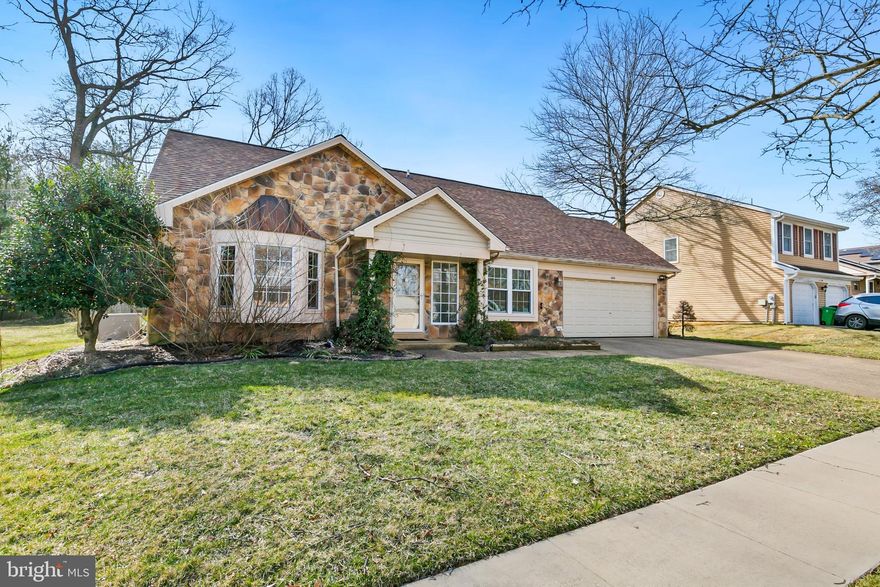 Welcome to this charming 3-bedroom, 2.5-bathroom home with excellent curb appeal and move-in-ready interior! Step inside to a bright and spacious open floor plan featuring vaulted ceilings and gleaming wood and tile floors. The versatile sunroom, complete with a sliding door to the deck, overlooks a large, flat backyard—perfect for outdoor entertaining. The light-filled table-space kitchen offers plenty of room for meals and gathering. The main level includes a bedroom with an en-suite full bath, plus a convenient powder room. Upstairs, the loft level features two additional bedrooms and a full bathroom. An attached two-car garage completes this fantastic home. Don't miss this opportunity!