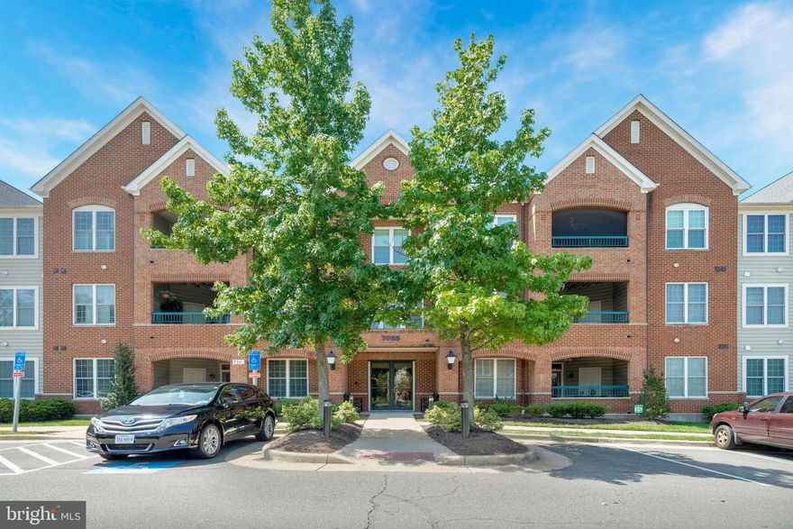 This great, move-in ready home is back on the market!!  Fresh paint from top to bottom, new carpet, a beautiful quartz countertop with new sink, faucet and  oven, vents were cleaned and home was professionally cleaned!  Fall in love with the beautiful active adult community of Heritage Hunt.  This unit is conveniently located on the main level, allowing super easy access to your new home.  Gorgeous wood floors in the main living area are complimented by a kitchen designed for ease of cooking and a pass-through to the sizable dining area.  The living room offers a mantled fireplace and overlooks a private porch with automatic screens for your outdoor enjoyment.  Finishing off the home you'll find a great space for an office, 2 comfortably sized bedrooms and 2 full baths!  There are planation shutters on all windows and doors, 4 ceiling fans and crown molding.  You'll love the convenience of a reserved garage parking space that offers access directly into the building elevator.  You will also have a conditioned private storage room on the garage level.  Condo living allows you more time to enjoy the country club lifestyle!  This gated community offers over 750 beautifully landscaped acres, 2-wellappointed clubhouses, a quality restaurant and bar, indoor and outdoor pools, tennis, pickleball and bocce courts, miles of walking paths and over 100 clubs and social events to enjoy.  Golf course memberships are available.  The main clubhouse and restaurant are within easy walking distance from this home.  This community offers easy access to many major commuting routes, shopping, restaurants and entertainment.  It is close to the newer UVA Haymarket Health Center which includes a hospital and many medical professionals' offices.  I can't list everything here, so stop in and visit soon!