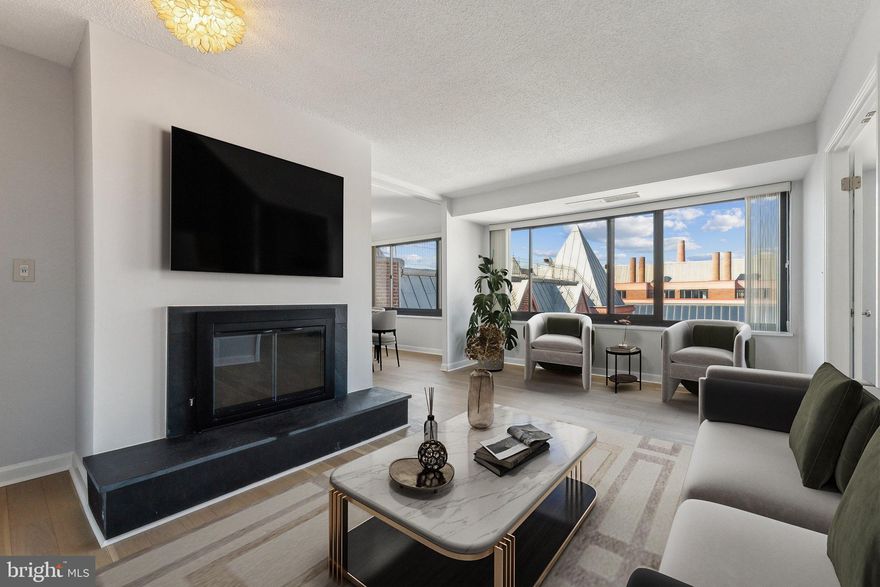 This newly renovated top-floor unit in the James Place building is ready for immediate move-in and offers the perfect blend of modern living and historic charm. Just steps from the Georgetown waterfront, this west-facing residence is bathed in natural light and boasts stunning sunset views over the iconic Georgetown skyline.
<BR> <BR>
The spacious living room features an open layout, a cozy fireplace, and beautiful white oak hardwood floors. It seamlessly flows into the dining area, making it perfect for entertaining. The updated kitchen has brand-new cabinetry, sleek quartz countertops, and premium Bosch stainless steel appliances.
<BR> <BR>
The bright and airy main bedroom offers a serene retreat with elegant white-tiled floors and an ensuite bathroom. The second bedroom is equally bright, with an abundance of natural light. Ample storage space is available throughout the unit for all your needs.
<BR> <BR>
Residents benefit from comprehensive HOA services, including 24/7 concierge, maintenance of common areas, use of hot and cold water, cleaning, painting, HVAC upkeep, elevator maintenance, and waste management—along with snow removal.
<BR> <BR>
The unit includes one reserved parking space and a secure, lockable storage unit. Conveniently located, it’s just a short walk to the shops and restaurants along M Street and to the Kennedy Center. With easy access to Route 66, the George Washington Parkway, Whitehurst Freeway, Downtown DC, and Northern Virginia, this location offers unmatched convenience.