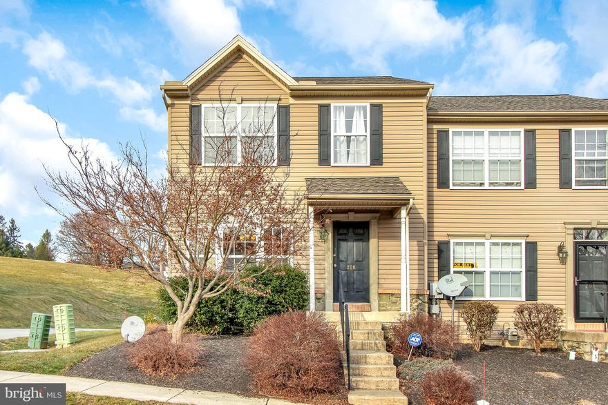 You will love this light and bright end-unit townhome available in  Manor Oaks.  Master bedroom with bath and walk-in closet. Open layout with spacious living room and door to deck. Fresh paint and newer roof. View of open space in the rear makes spending time on the deck and patio a pleasure. Additional living space in the finished basement. Convenient rear parking spaces for two cars. Carefree living with snow removal and lawn care included.