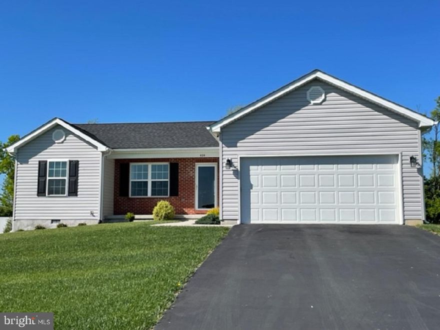 Multiple offers received. Please send highest and best by 3:00 PM Sunday May 29-seller will make decision Sunday evening. Thank you for showing.  Welcome to wild, wonderful West Virginia.  This cozy home backs to private land in the back of the neighborhood (so no homes behind it).  The open floor plan and vaulted ceilings of the main living area invite you in.  There's a great deck through the patio doors for summer get togethers.  A low maintenance VINYL privacy fence encloses the large, level backyard.  Restaurants, grocery store, schools and other amenities nearby.