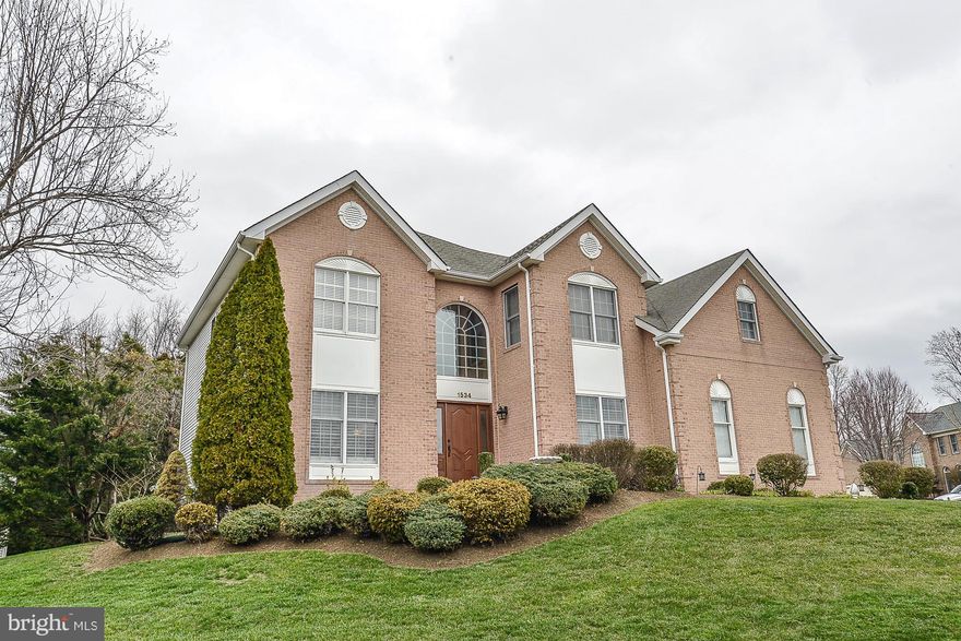 **Priced to sell** Gorgeous corner lot, 3 fabulous levels, 4 bedrooms, 4.5 baths, bonus room, gym, wet bar, front and rear staircases, main level office, family room with vaulted ceiling, large master suite, 2 story deck, SS appliances, and granite counters. New paint, new flooring, with 2-car garage, low maintenance backyard and tons of upgrades. This Gem is great for indoor/outdoor entertaining.