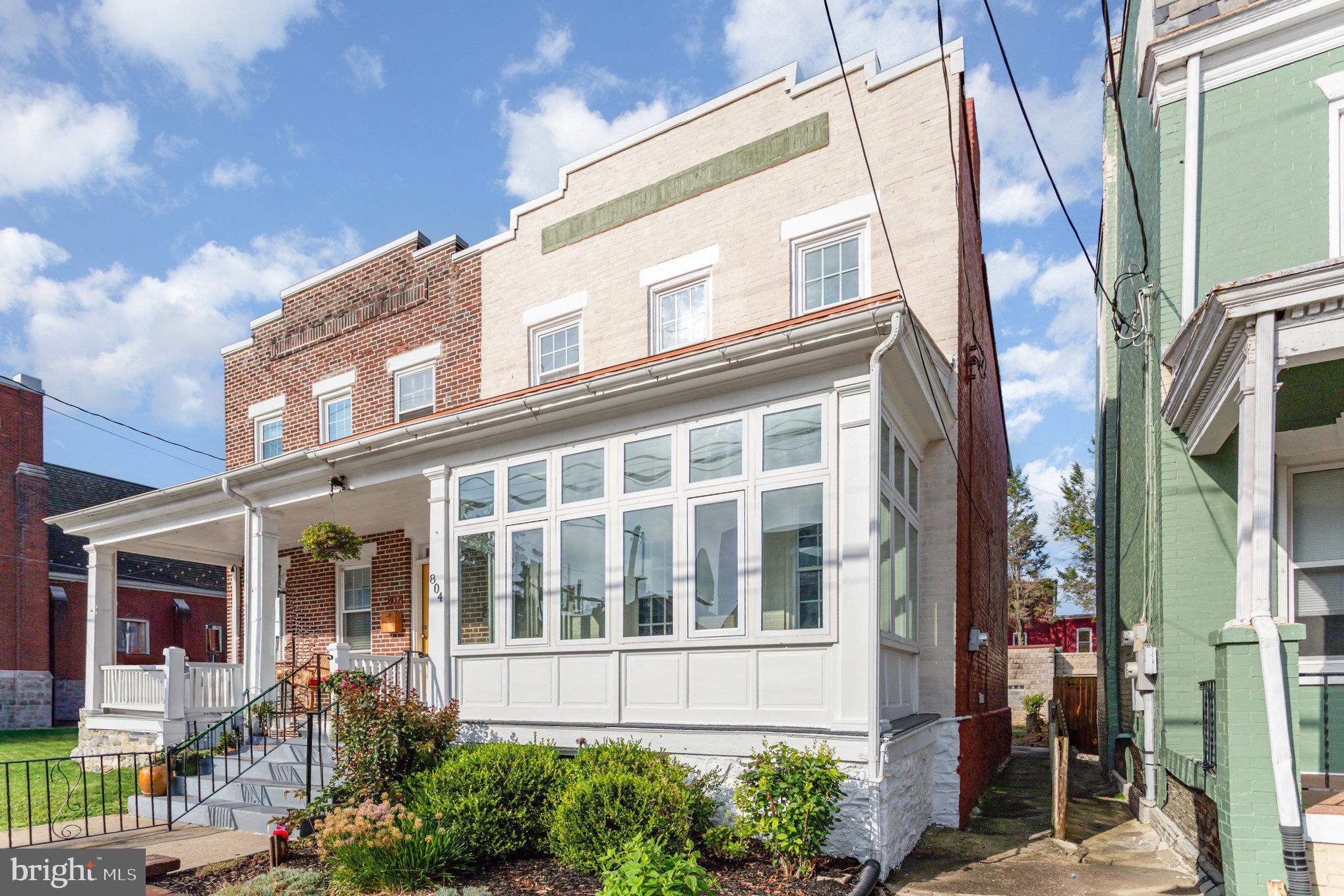 You are welcomed by an enclosed front porch lined with panoramic windows. Step inside to a warm, light-filled living room where a fireplace serves as the centerpiece. From there, the space transitions into a formal dining room that flows seamlessly into the kitchen—the true heart of the home. This brand-new kitchen features white shaker cabinets, granite countertops, stainless steel appliances, and plenty of storage. The fully remodeled bathroom shines with a quartz vanity, tiled tub/shower surround, and premium Moen fixtures.
Throughout the home, you’ll find solid black walnut doors with original hardware, refinished hardwood floors, updated lighting, fresh neutral paint, new windows, and completely upgraded electric, plumbing, and HVAC systems for comfort and peace of mind.
Bright and open living and dining areas flow seamlessly into spacious bedrooms and a stunning four-seasons room with panoramic views—ideal for year-round natural light, a cozy reading nook, or entertaining in style.
The fenced backyard offers a private retreat, while the large basement—with recessed lighting, a Drylok-sealed foundation, and ample storage—provides endless possibilities for finishing or flex space. Gorgeous full-glass front and rear doors add both curb appeal and sunlight.
Parking is a breeze with abundant street parking right out front and the option of a garage rental directly behind the property.
Set on a quiet, walkable street just minutes from downtown Lancaster’s shops, restaurants, and Central Market, this home is a rare find—offering class, comfort, and convenience all in one.