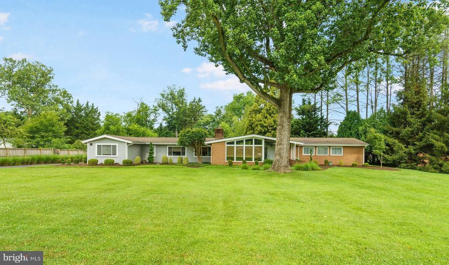 Unpack your bags and move right in! This rare opportunity in Stevenson offers a sprawling mid-century rancher with every amenity you could dream of. Step inside to an inviting open living and dining space featuring gleaming walnut hardwood floors and wall-to-wall sliders that flood the home with natural light and lead out to the beautifully landscaped yard. The gourmet kitchen is a chef’s delight, showcasing stunning cabinetry, granite countertops, Thermador appliances, an island with a built-in table, and a butler’s pantry with abundant storage. Need extra space? A bonus room provides built-in cabinets, even more storage, and an office area. Cozy up by the fireplace in the sunken family room, complete with shelving for your treasures and new Pella windows that bathe the room in light. Retreat to your primary suite with new carpet, built-in drawers, California closets, and a luxurious attached bath featuring dual vanities and a spacious, custom-tiled shower. Three additional bedrooms also boast new carpet and are served by two more beautifully updated bathrooms with custom tile showers and floors. Work from home in style with a dedicated office space featuring a charming barn door for privacy. Unwind in the sunlit den with your favorite book. Outside is an entertainer’s dream: a large fenced yard perfect for summer BBQs and gatherings, plus a new covered flagstone patio installed just 2 years ago. Additional updates include: Furnace/HVAC (2018), Water heater (2018), New driveway (2025), Fence (2025), Roof (2020)
Conveniently located near 695, Reisterstown Road, Park Heights and tons of shops and restaurants. Don’t miss your chance to own this exceptional Stevenson home — it’s everything you’ve been waiting for!