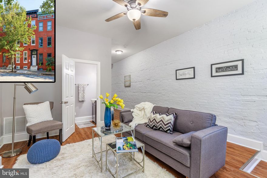 BEAUTIFULLY DESIGNED ROW HOME WITH TONS OF CHARACTER AND CHARM! Enter into a spacious living area with high ceilings, exposed brick walls and seamless flooring that leads right into your formal dining area.  Off the formal dining area is your dream kitchen with custom cabinetry, stainless steel appliances, and granite counter tops.   Conveniently located right off the main living room is a renovated powder room.  On the second floor are two very spacious bedrooms a completely remodeled full bathroom and a laundry area.  On the third floor are two additional very spacious bedrooms. This home has an unfinished basement that is great for storage and a deck/patio area off the main level that is perfect for entertaining.  Fresh paint and flooring make this home ready to move right into - no detail has been overlooked!  House is vacant and easy to show so schedule your showing today!