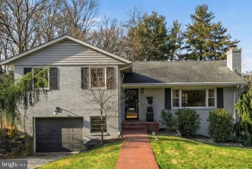 Start the year off right in this gem of a home in Country Club Hills! Located in a quiet cul-de-sac this 4 BR/3BA home has a thoughtfully renovated kitchen, modern bathrooms, and fresh interiors that combine for effortless living in a friendly, walkable neighborhood. 

The renovated kitchen features quartz countertops, new lighting, a new cooktop, and stainless steel appliances. The home's interior has just been painted throughout the the beautiful white oak hardwoods have just been refinished. The home includes a converted fourth bedroom and swanky bathroom from a 2025 renovation and a tasteful master bath update from 2023. 
A lower-level walk-out basement adds flexible space with new carpet and a cozy fireplace. 
The garage has been upgraded with new flooring and shelving creating functional storage. 

Outdoor living is highlighted by a deck, beautifully landscaped yard, and close proximity to Gulf Branch Nature Trail and Nature Center, Madison Community Center and Glebe Road Park. The entrance to the trail is at the top of the street! Regular block parties and neighborhood gatherings help create a warm and welcoming atmosphere. 

The lovely, inviting charm of this turn-key home coupled with a highly desirable school pyramid, easy access to major commuter routes and parks galore make it an easy decision for anyone seeking comfort, convenience, and community in Arlington. OPEN HOUSE SUNDAY 2-4pm. *Offers, if any, are due Tuesday at noon*