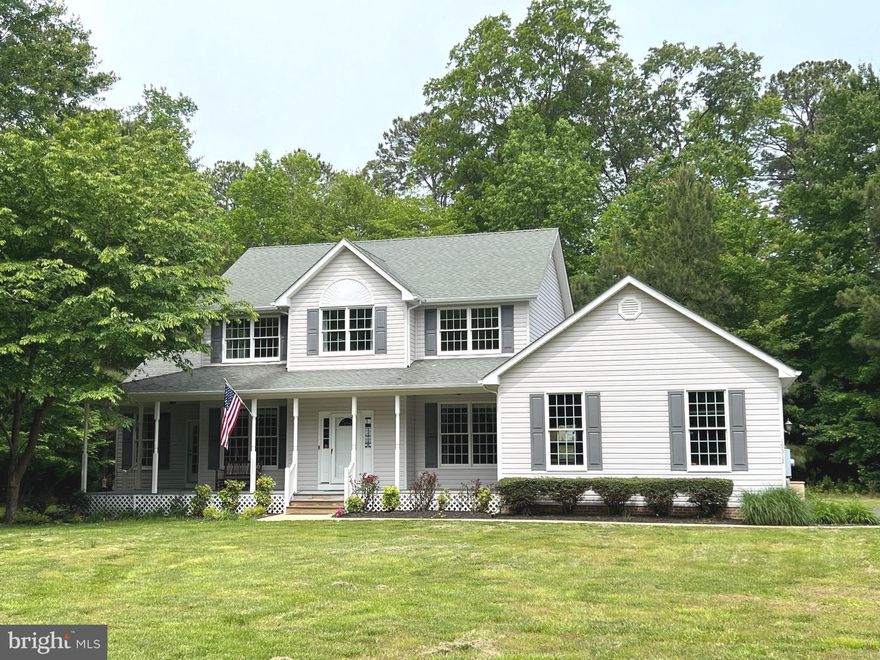 Cape cod style with open floor plan.  Chefs kitchen complete with gas cook top, double ovens, stainless aplliances, granite counters, large island &  two tone cabinets.  Hardwood in great room, kitchen, dining room & foyer.  Main level mater suite, laundry &  separate office.  Builts ins.  Plenty of windows for extra light.  French doors to back deck & front porch.  Upper level has a large loft, two bedrooms & a jack & jill bathroom.  Private lot.  Gas back up HVAC, dual zone.  House generator.