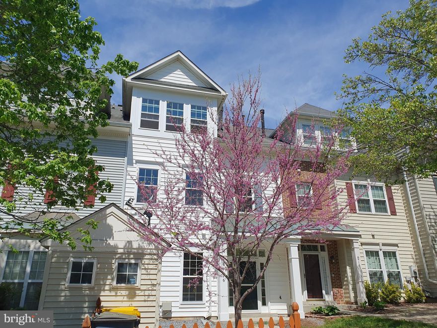 Welcome to Burgundy Place in The Rotary at Piney Orchard—a highly sought-after location known for its charm, convenience, and vibrant community! This stunning 3-level interior townhome is move-in ready and packed with upgrades. Step into a bright, open, and airy layout featuring brand new carpet throughout and bathed in natural light. The main level offers a spacious living and dining area that flows seamlessly into a well-appointed kitchen with stainless steel appliances and abundant cabinet space, plus a convenient powder room for guests.

On the second level, you’ll find two spacious bedrooms, a full bathroom, and a laundry room for added ease. Retreat to the entire third floor dedicated to the luxurious primary suite, complete with a cozy natural gas fireplace and a ensuite bath with double vanity—your own private haven.

Enjoy peace of mind with brand new energy-efficient windows plus a newer AC unit and water heater (both less than 2 years old). Take full advantage of Piney Orchard’s top-tier amenities: a sparkling community pool, recreation center, tennis courts, walking trails, trash and snow removal, and lawn and exterior maintenance all included through the HOA.

Don’t miss your chance to live in one of Piney Orchard’s most desirable neighborhoods—schedule your private tour today and make this incredible home yours!