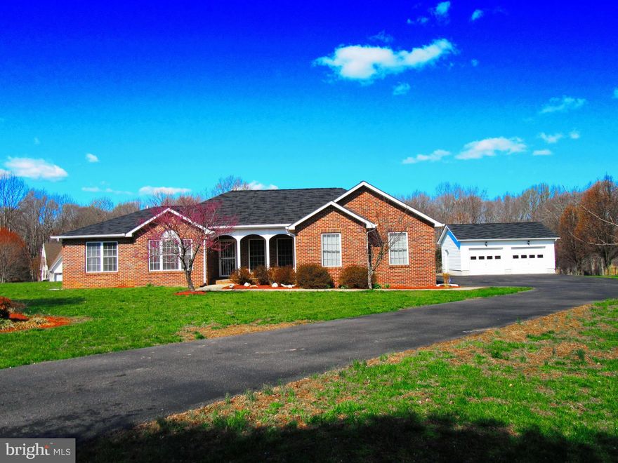 Move in Ready!! Magnificent rambler situated on 2 acres! Split bedroom floor plan with a finished basement. Kitchen w/table space & doors to screened in porch. Sep Din Rm. Huge Family Rm w/FP. Office/Den. 2nd & 3rd BR share jack-n-jill bath..and both have WICs. Large finished basement w/full bath. 4 garage spaces. Level yard, Perfect place for entertaining guests or relaxing quietly. No HOA!